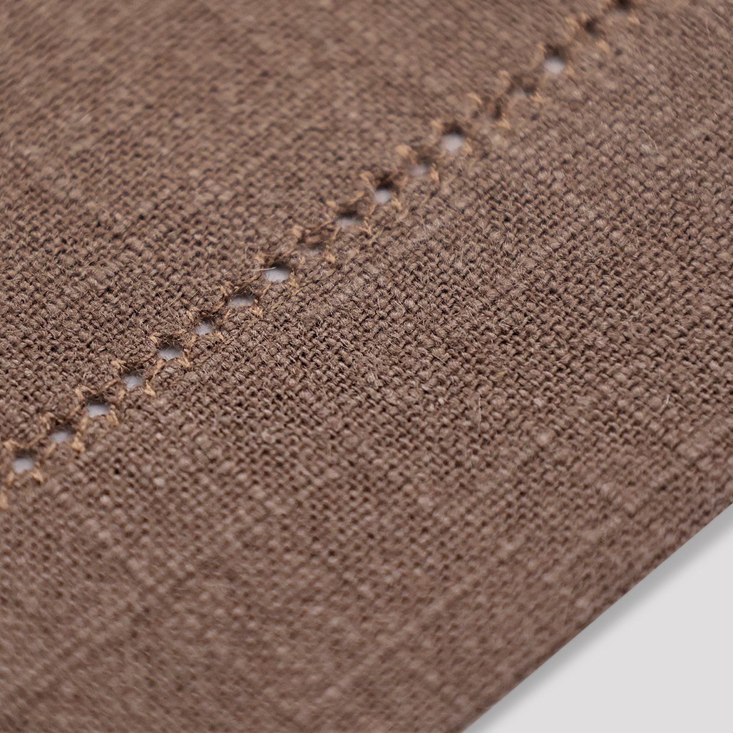 Dark brown cotton napkin with hemstitched details
