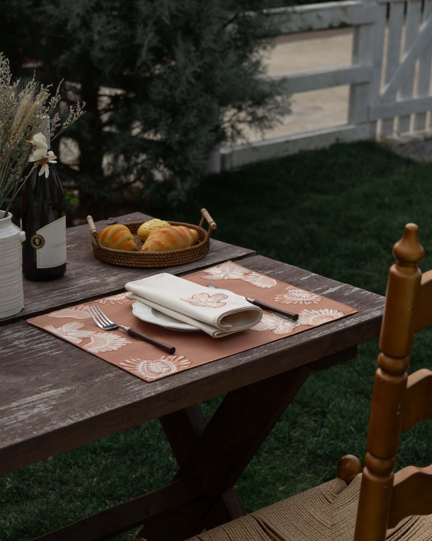Dinner outside, while the light is still soft.

Dionaea placemat and napkin in warm terracotta, made from 100% cotton with raised embroidery that adds quiet structure to the table.

#embroideredplacemats #embroiderednapkins #tablelinen #diningtablede