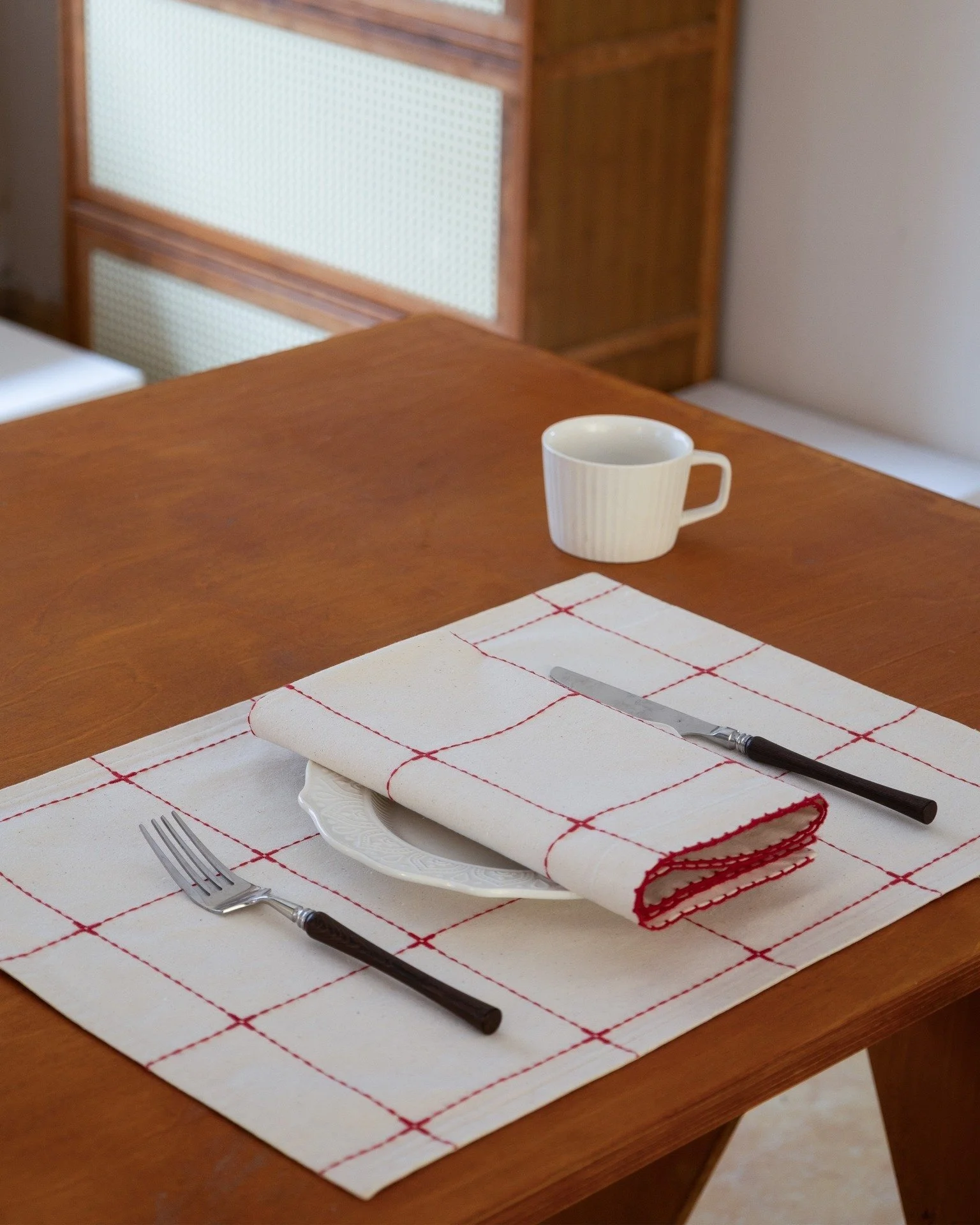 Some days, setting the table is less about the meal itself and more about trying to make the day feel a little softer.

A favorite cup, a familiar plate, the quiet sound of cutlery on fabric &mdash; small things, but somehow enough to slow everything