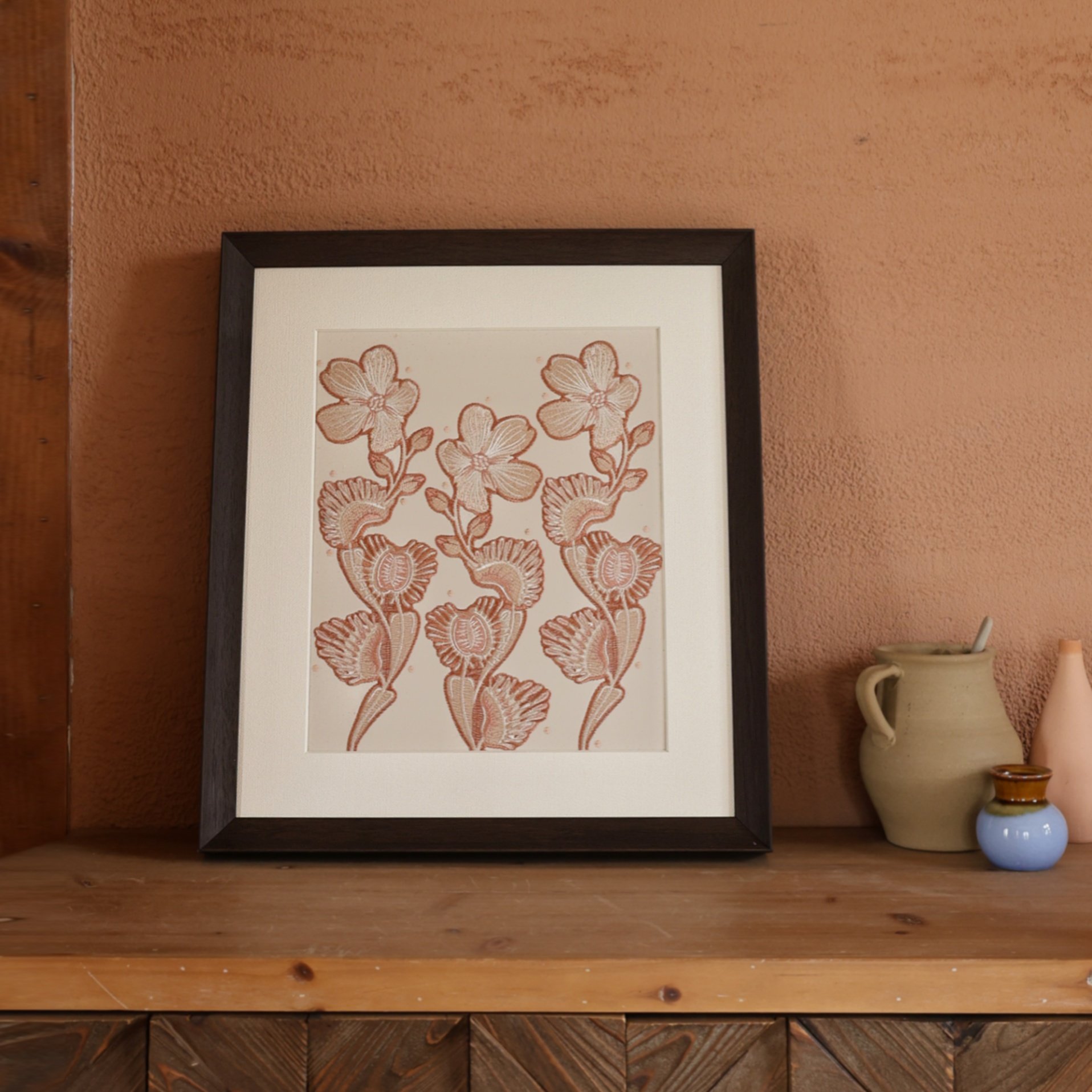 Dionaea flytrap flower embroidery art placed in front of a terracotta wall