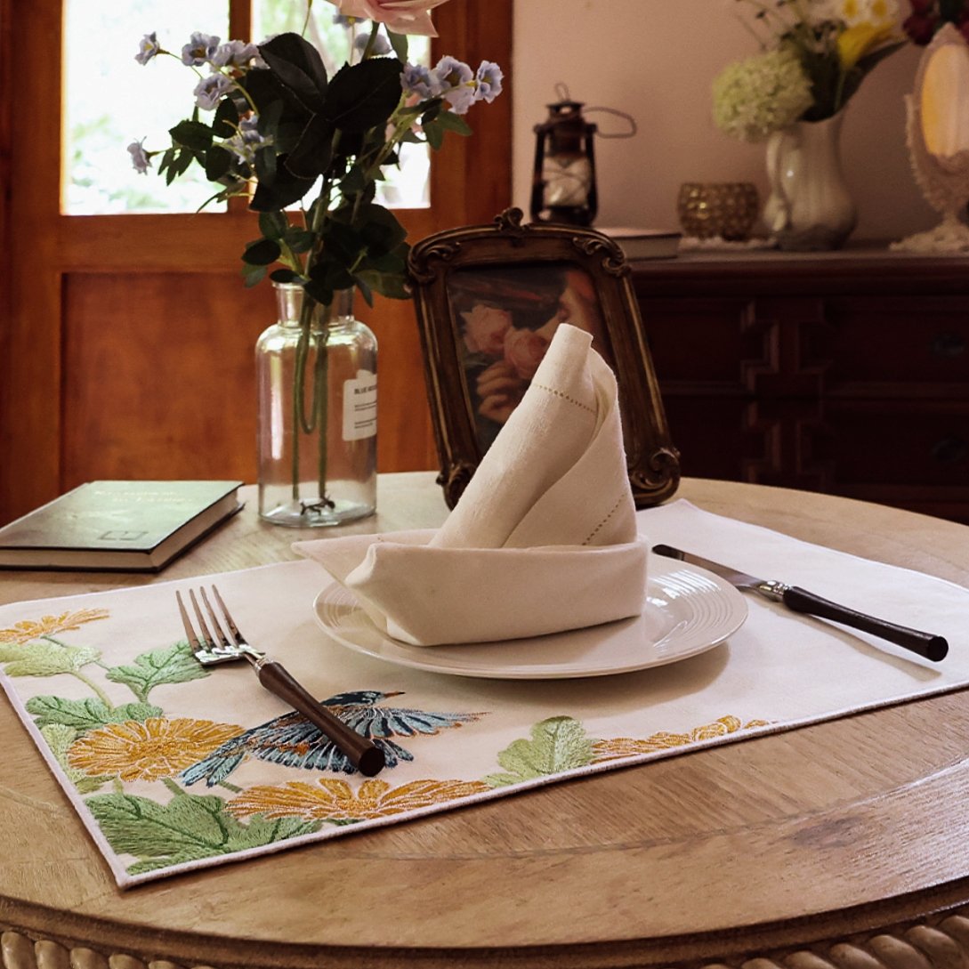 white ramie cotton hemstitched napkin in table arrangement with Pam Pan's Garden series placemat