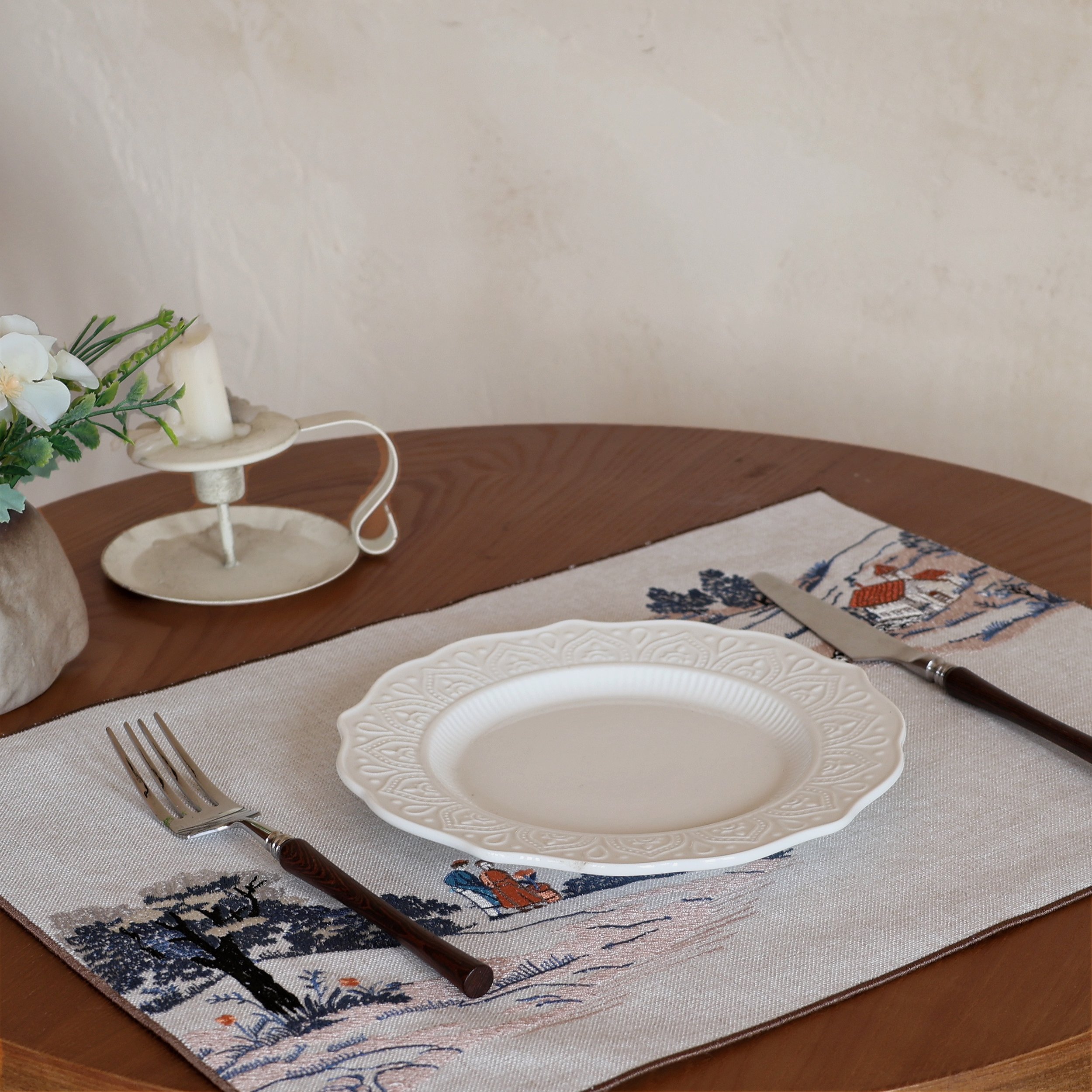 Embroidered Landcape Placemat on a Round Table