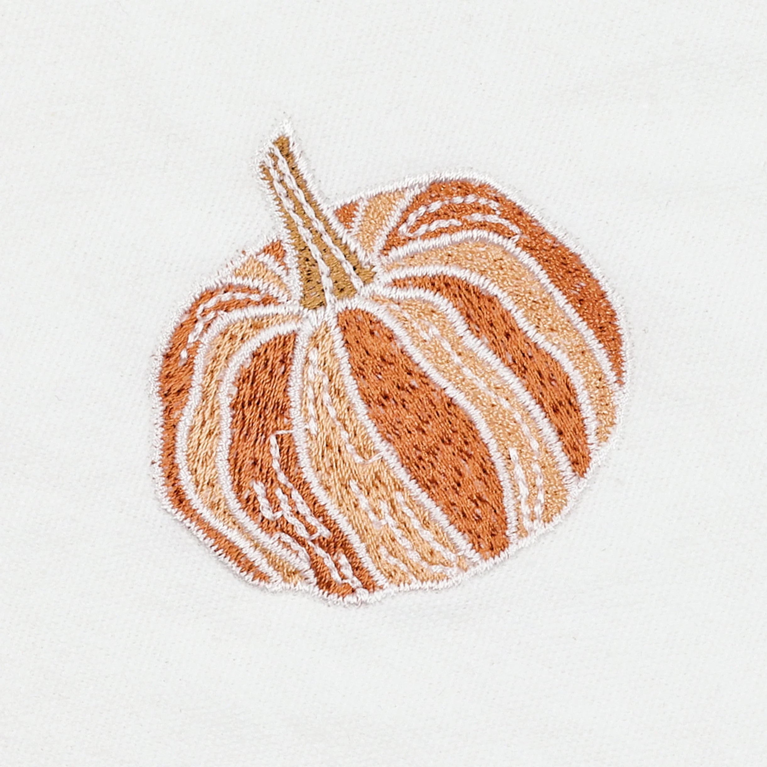 Close-up detail of orange pumpkin embroidery on white fabric — fine stitch texture from Pam Pan Pumpkin Series, premium embroidered cotton coaster for fall home décor.