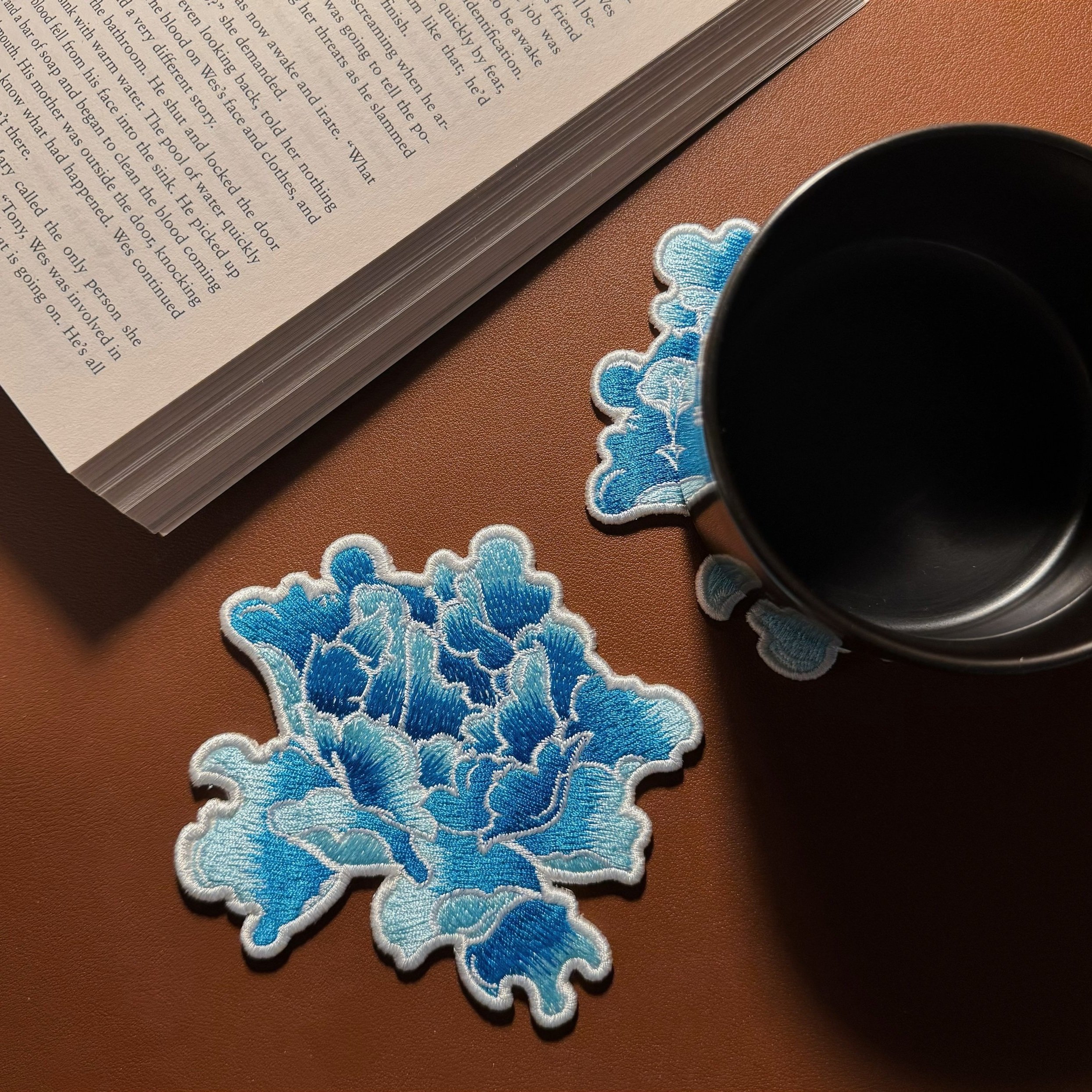 Etherelle Blue Flower Bloom Embroidered Coaster on the Desk with Books