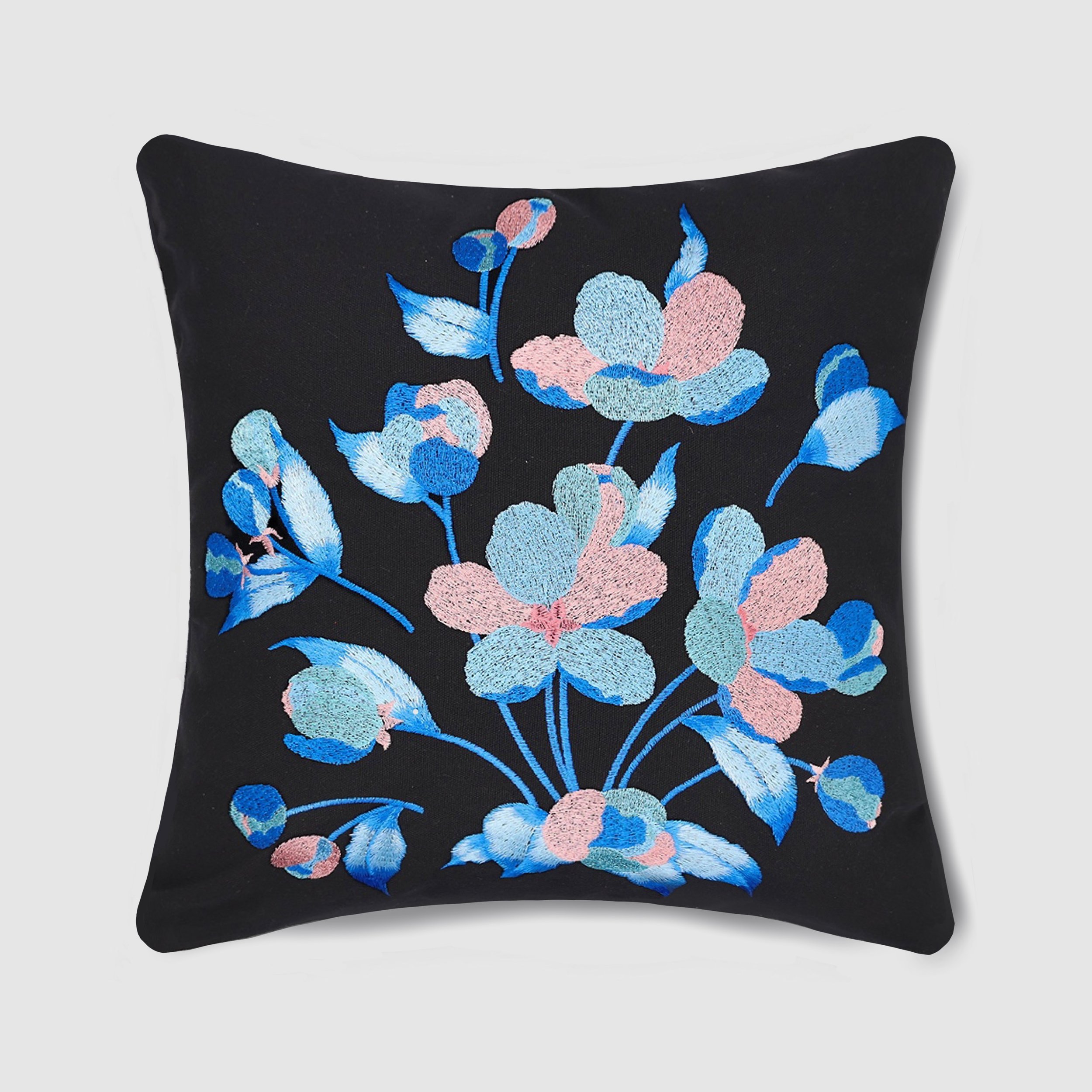 Black cotton throw pillow with light blue and pink floral embroidery from the Etherelle Series by Pam Pan.