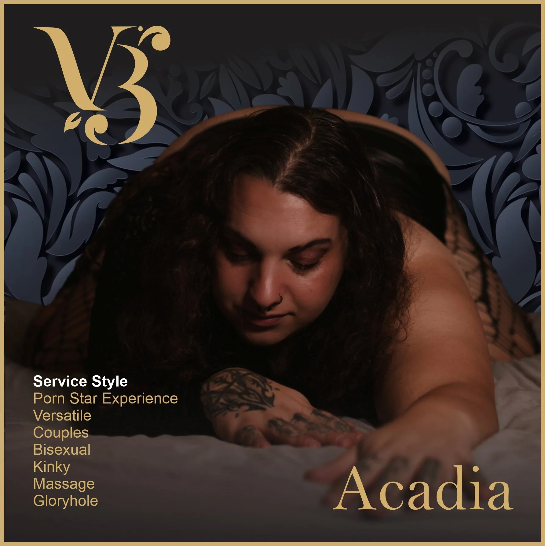 A woman with dark curly hair and tattoos lying on a bed, looking down. The background features a dark floral pattern with a golden logo in the upper left corner. Text on the lower left describes service styles including porn star experience, versatile, couples, bisexual, kinky, massage, and glory hole. The word "Acadia" appears in large gold letters at the bottom right.