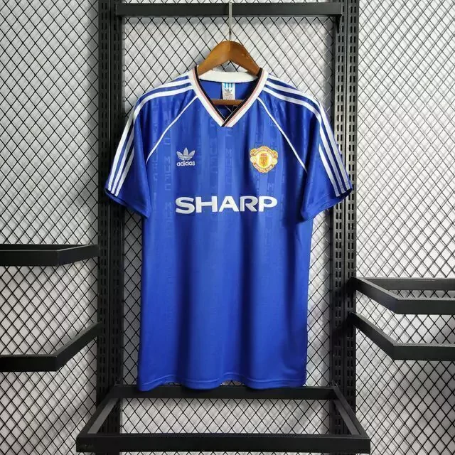 camisa-retro-man-united-86-88-third-away-masculino-adidas-azul-imagem1-jpeg1-4764c3ca1156ee1edf16946656848274-1024-1024.webp
