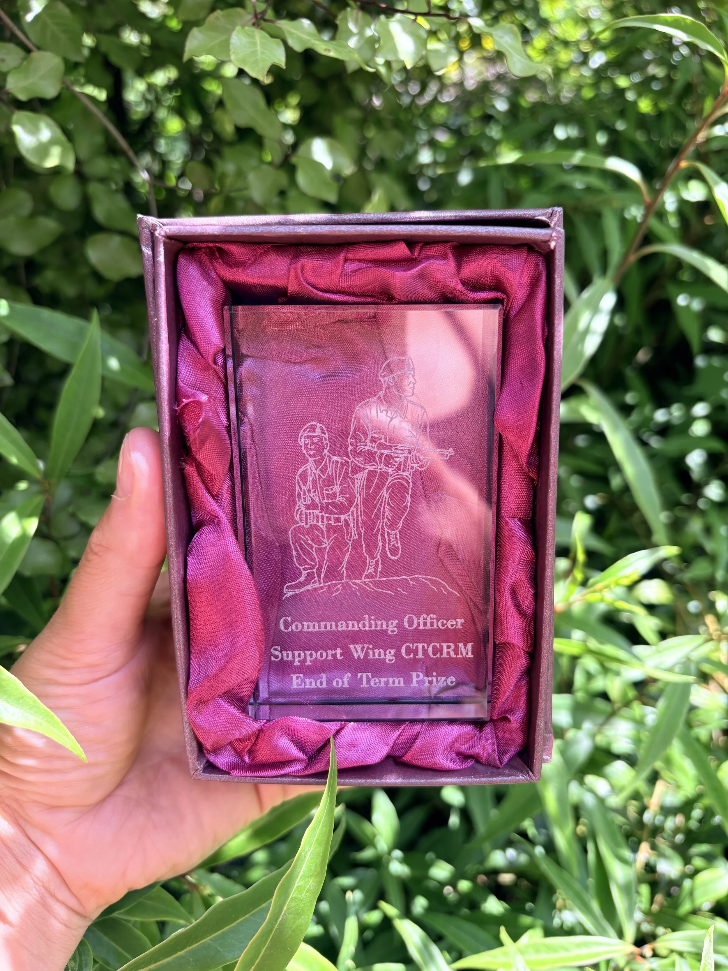 Engraved glass paperweight in satin-lined presentation box, Commando training design
