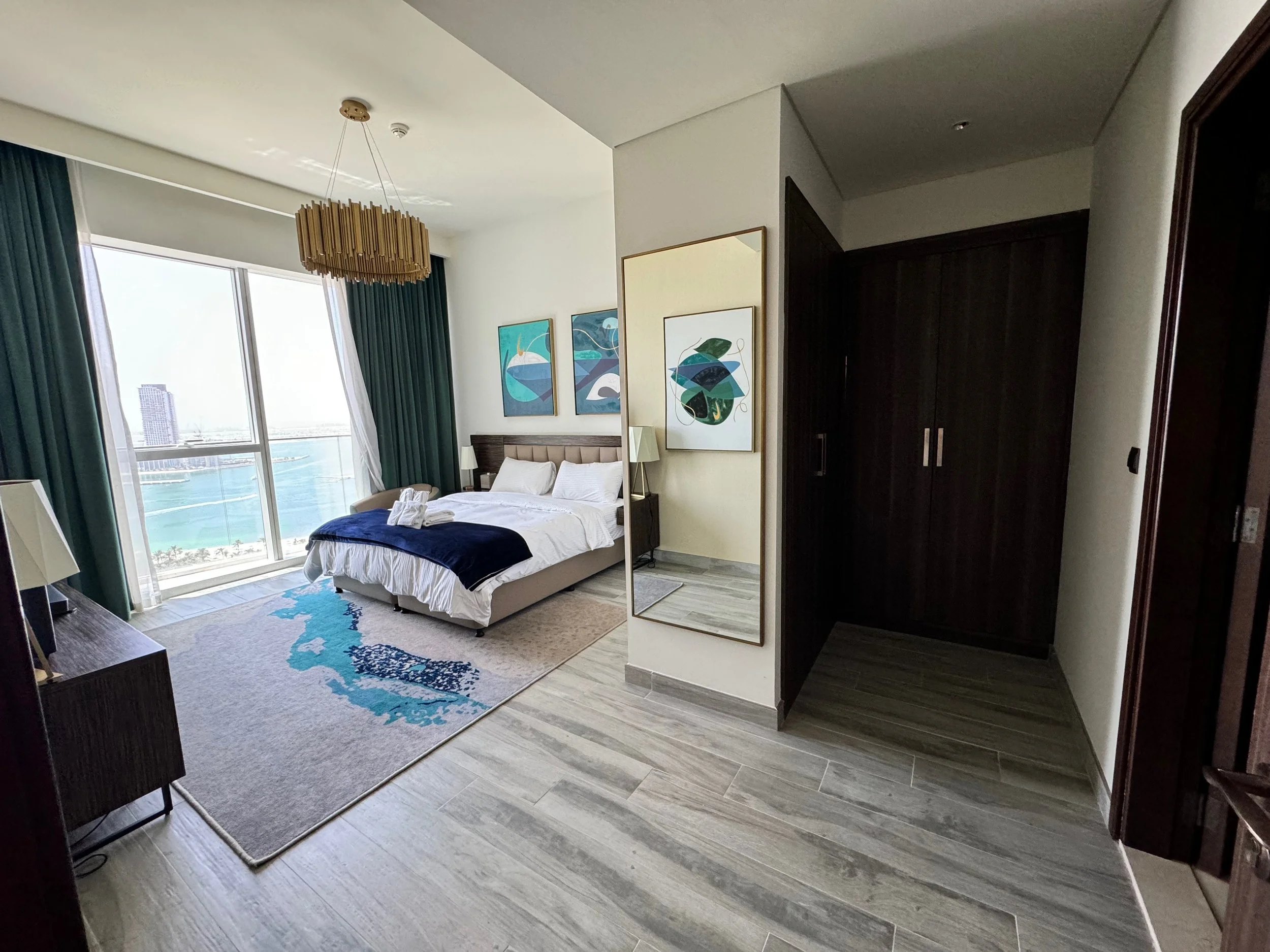 Spacious bedroom with plush king bed in Dubai holiday home at Avani Palm View