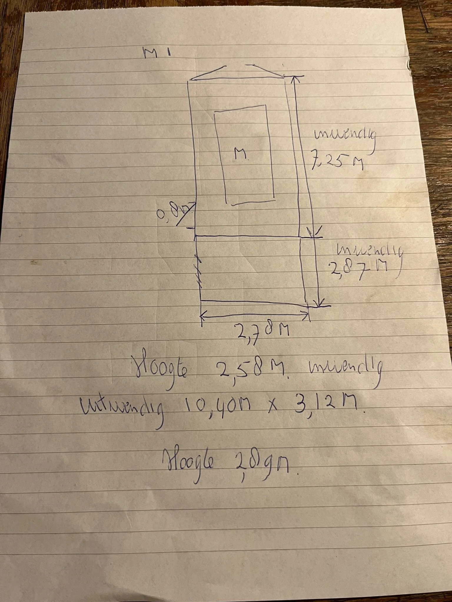 Hand-drawn geometric sketch with labeled measurements in meters, including dimensions of 2.78M, 7.25M, 2.87M, 10.40M x 3.12M, and notes on height in Dutch."