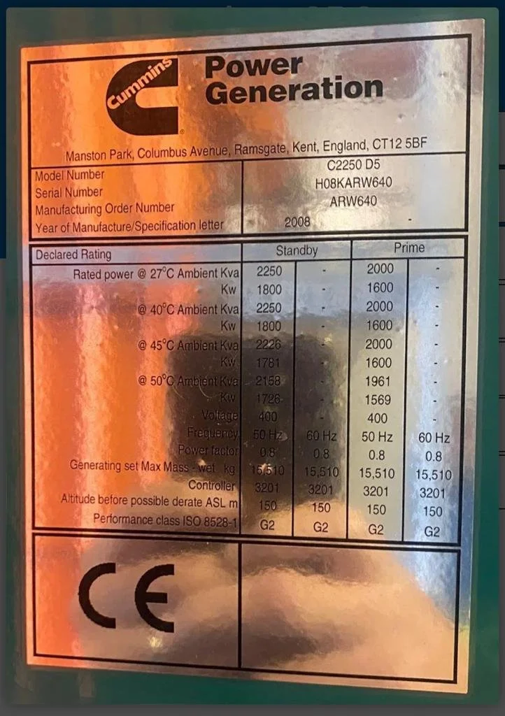 Label for Cummins Power Generation unit showing technical specifications, model number C2250 D5, serial number H08KARW640, manufactured in 2008, with ratings for various ambient temperatures, voltage, frequency, and controller information.