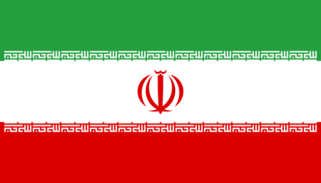 Flag of Iran featuring green, white, and red stripes with an emblem in the center and script along the borders.