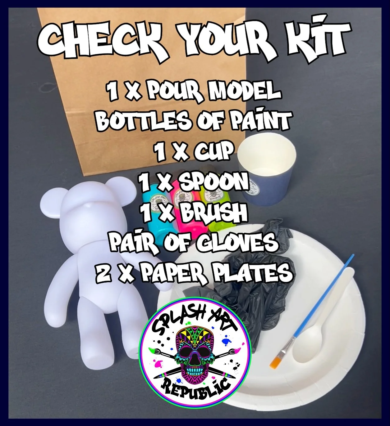 A crafting kit with instructions for model-making. Items include a bear-shaped figure, bottles of paint in colors blue, pink, and green, a paper cup, a paintbrush, a pair of gloves, two paper plates, and a small container, with a logo that says 'Splash Art Republic' featuring a colorful skull with paintbrushes.