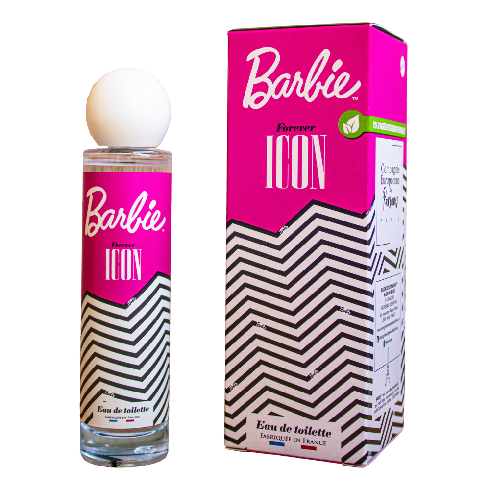 Un flacon de parfum Barbie Icon à côté de sa boîte, tous deux avec un design rose et noir avec des motifs en zigzag.
