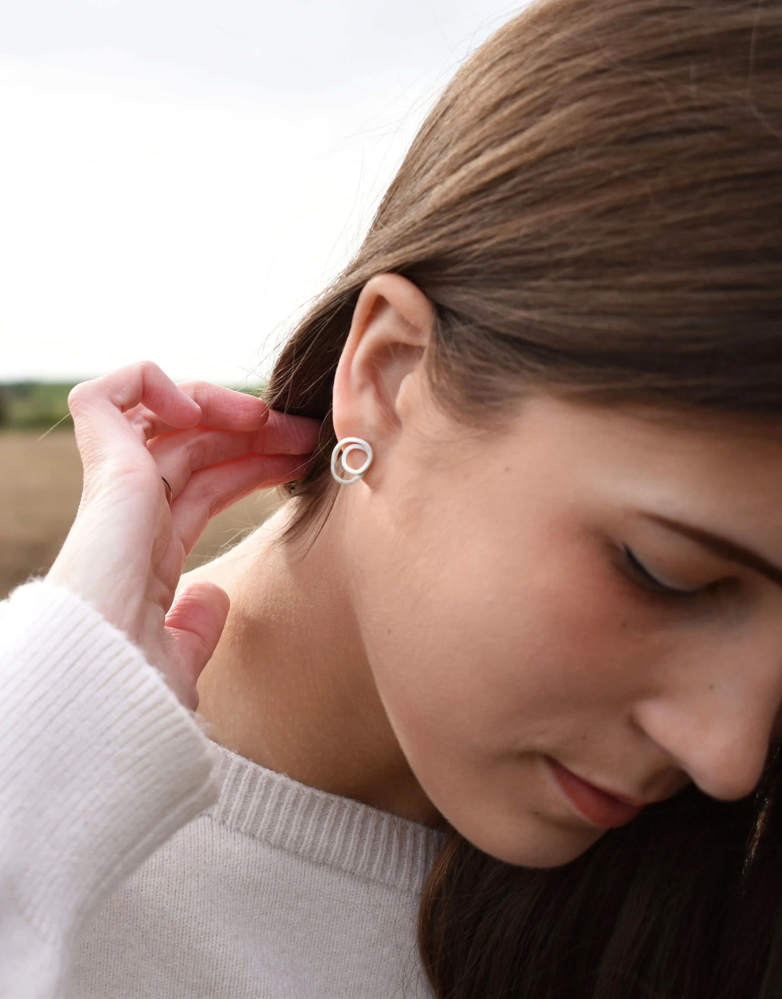 SWIRL studs silver 1.jpg