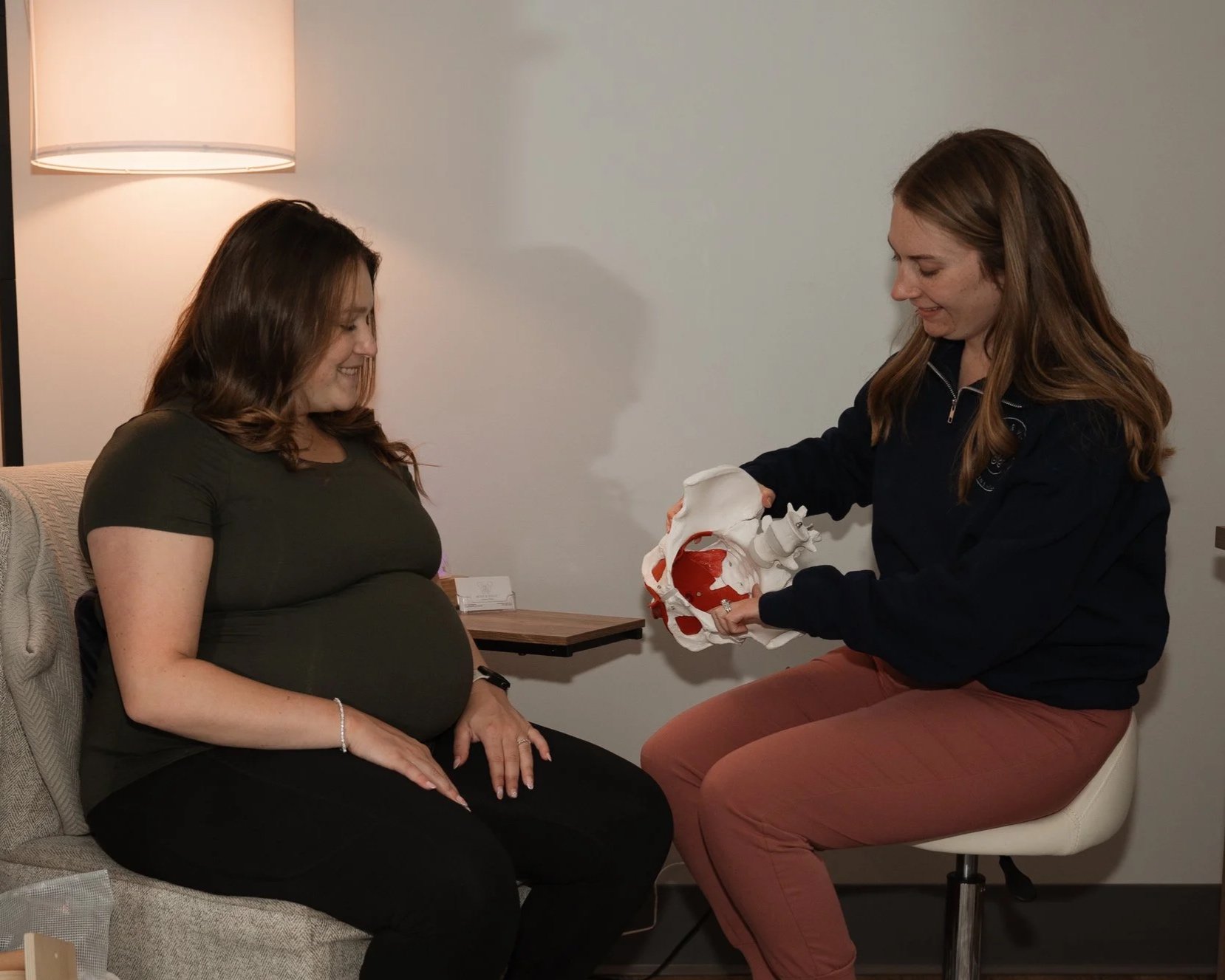 Pelvic Floor Physical Therapist Discussing pain during pregnancy to 30 week pregnant client
