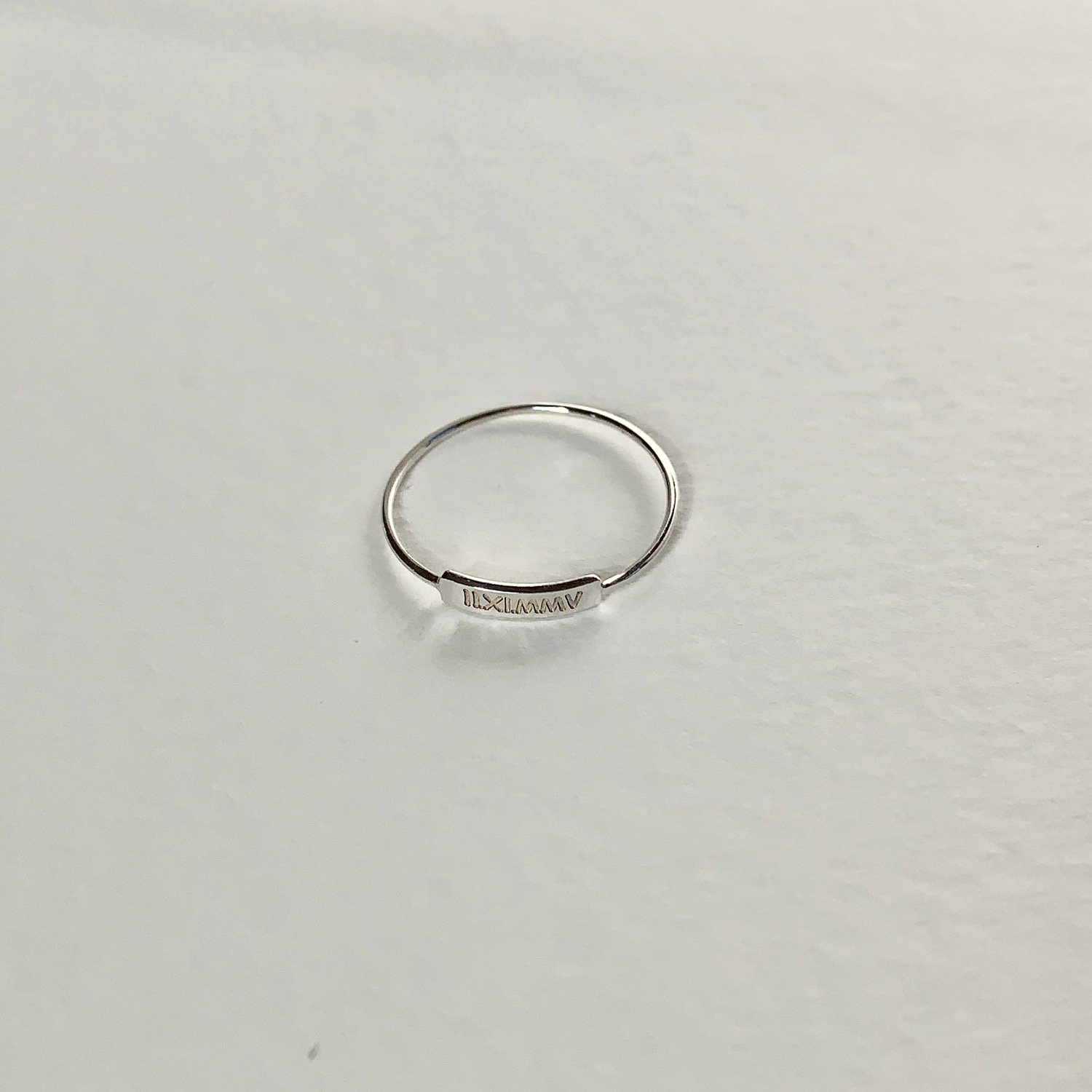 tiny-nameplate-ring-white-gold.jpeg