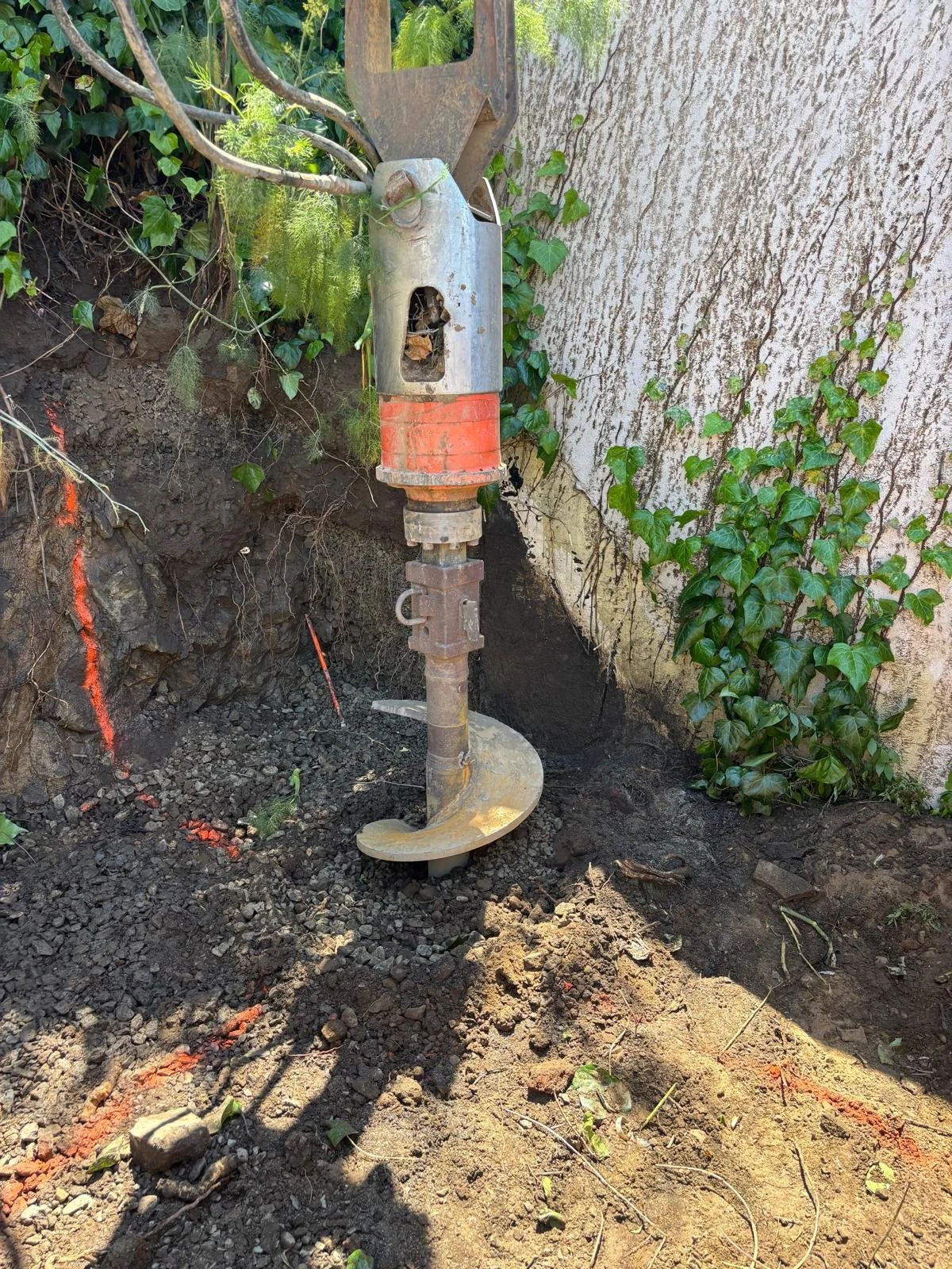 Close-up view of the drill bit used for beam hole drilling.