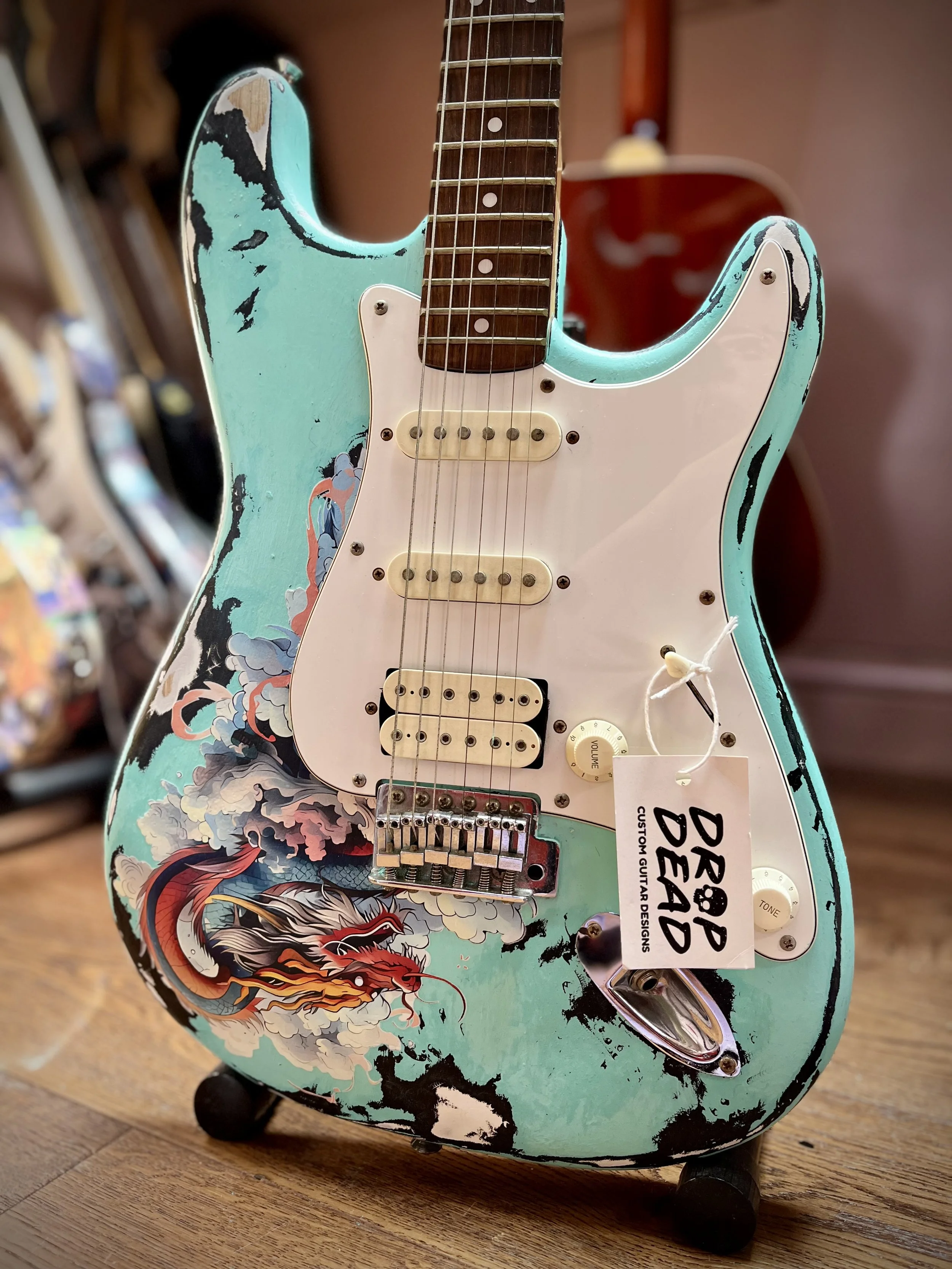 Stratocaster Encore electric guitar with Japanese Dragon tatsu (竜) design