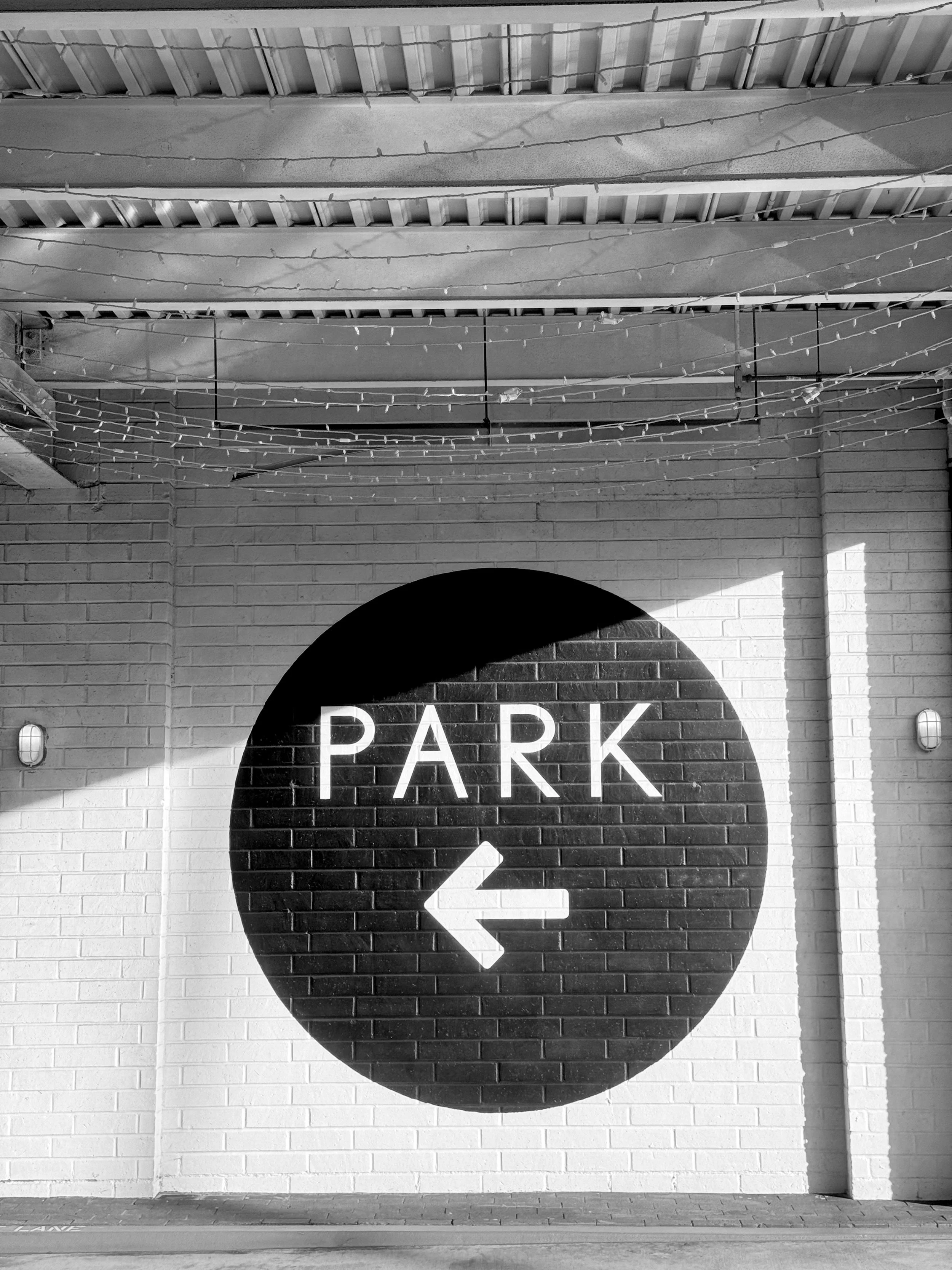 Black Circle Park Sign
