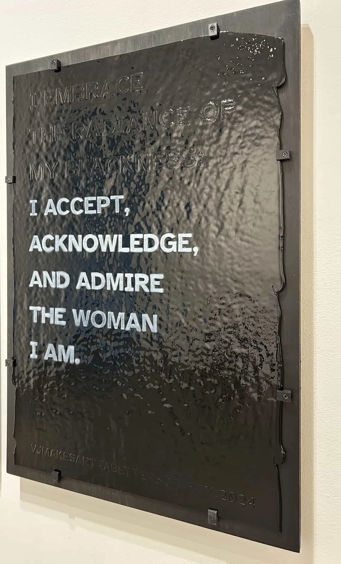 A Constellation of Blackness: Rendering Invisibility, Hypervisibility, Devaluation, and Triumph; (TRIUMPH), 2024. Hand-screenprinted broadsides on stiff black opalescent Bullseye glass, black frit, dense white frit, kiln fired. 20x30” each (set of 4)