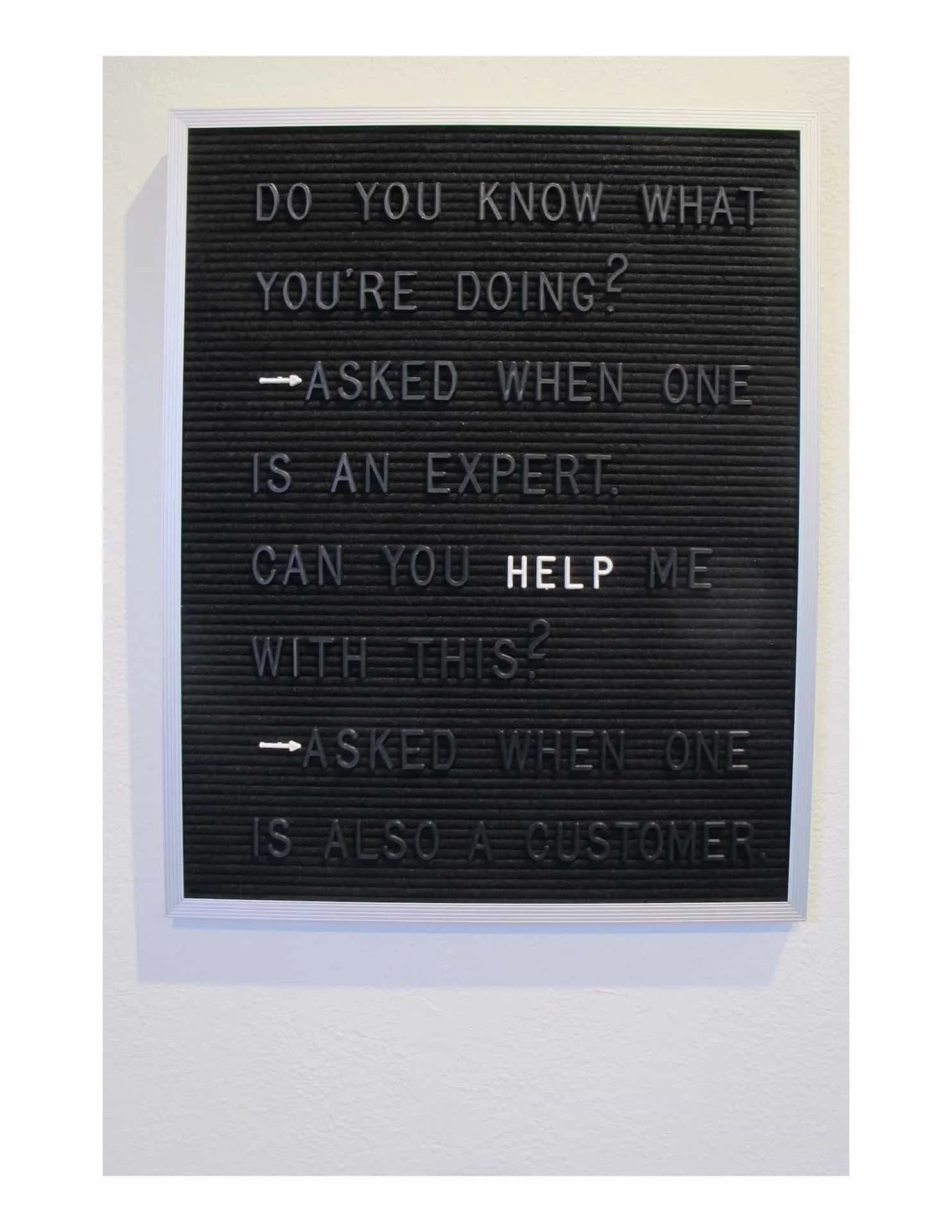 Language of Invisibility on Display, 2017. Four felt-lined bulletin board panels, plastic letters, aluminum frame. 16 x 20” each (set of 4).