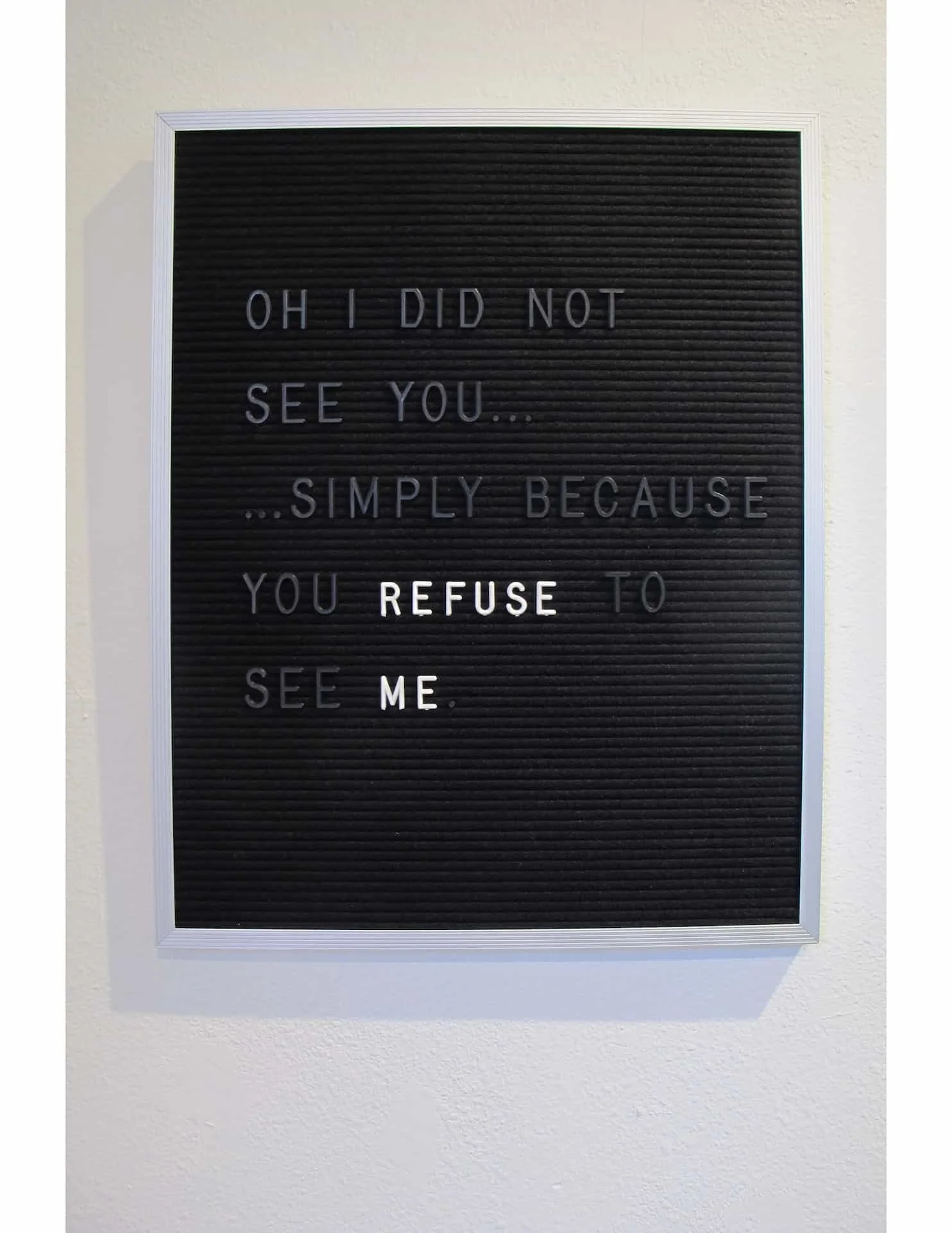 Language of Invisibility on Display, 2017. Four felt-lined bulletin board panels, plastic letters, aluminum frame. 16 x 20” each (set of 4).
