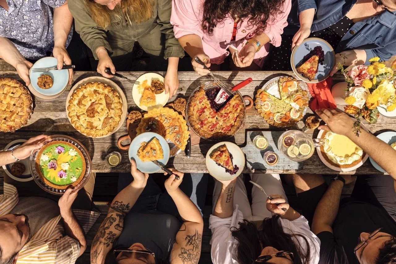 A table full of pies
