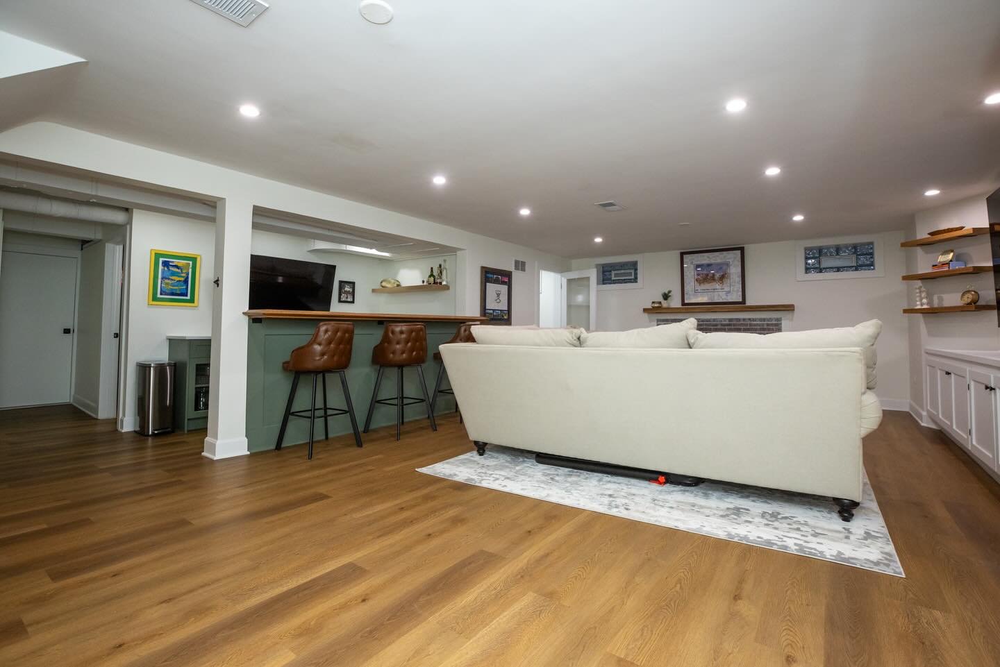 Using every square inch of a Chicago Georgian basement to create this beautiful living and social space. Cheers!