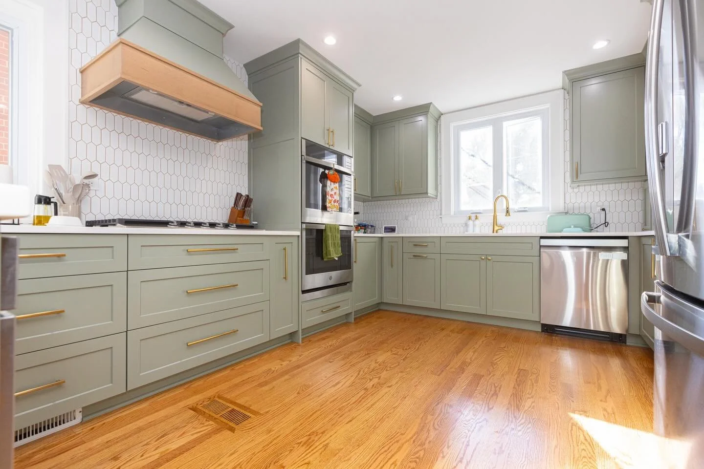 Reimagining a dark, closed off kitchen in Beverly, Chicago as an inviting and open space, embracing the natural light with a softened color palate.