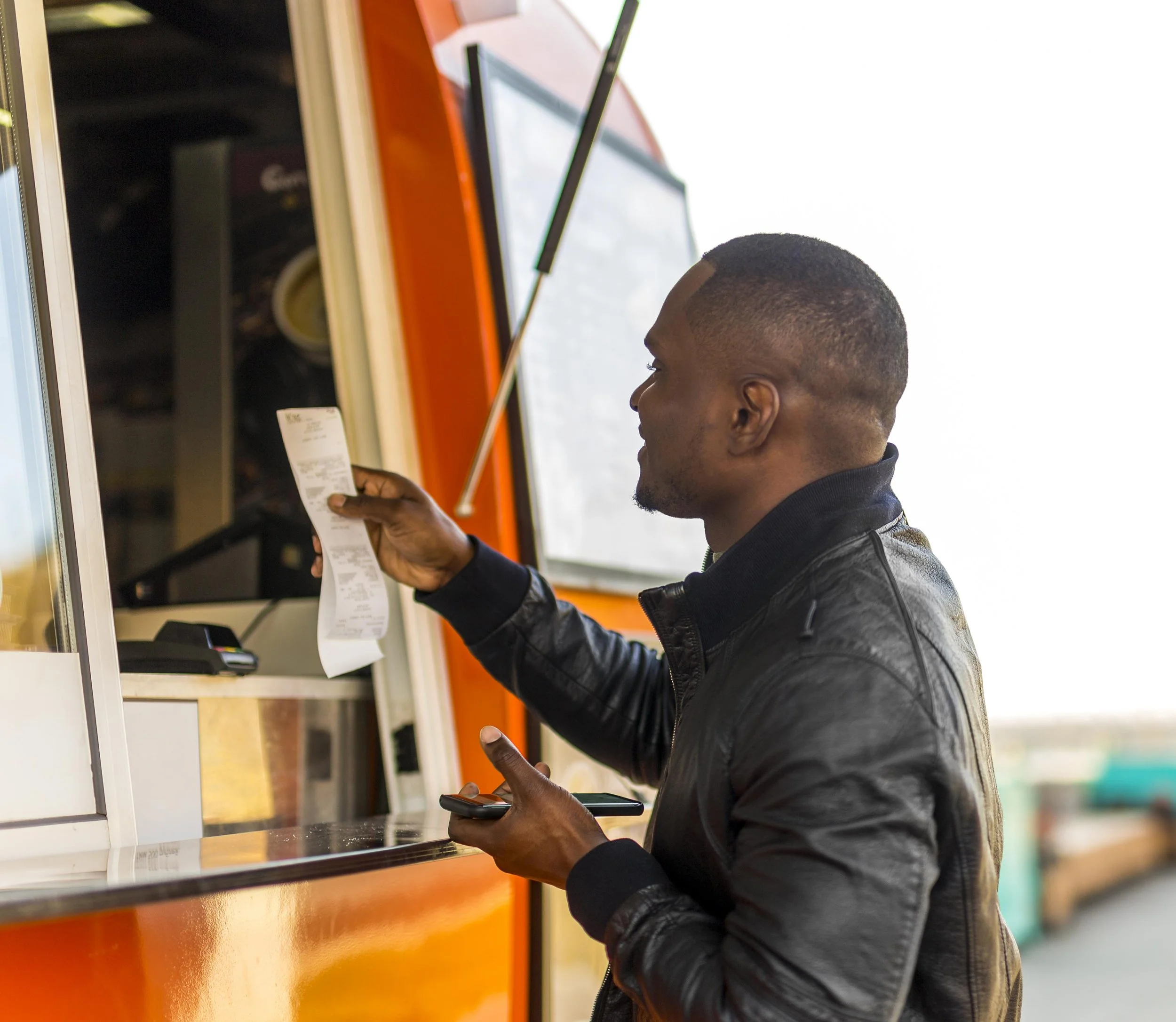 man-placing-order-food-truck.jpg