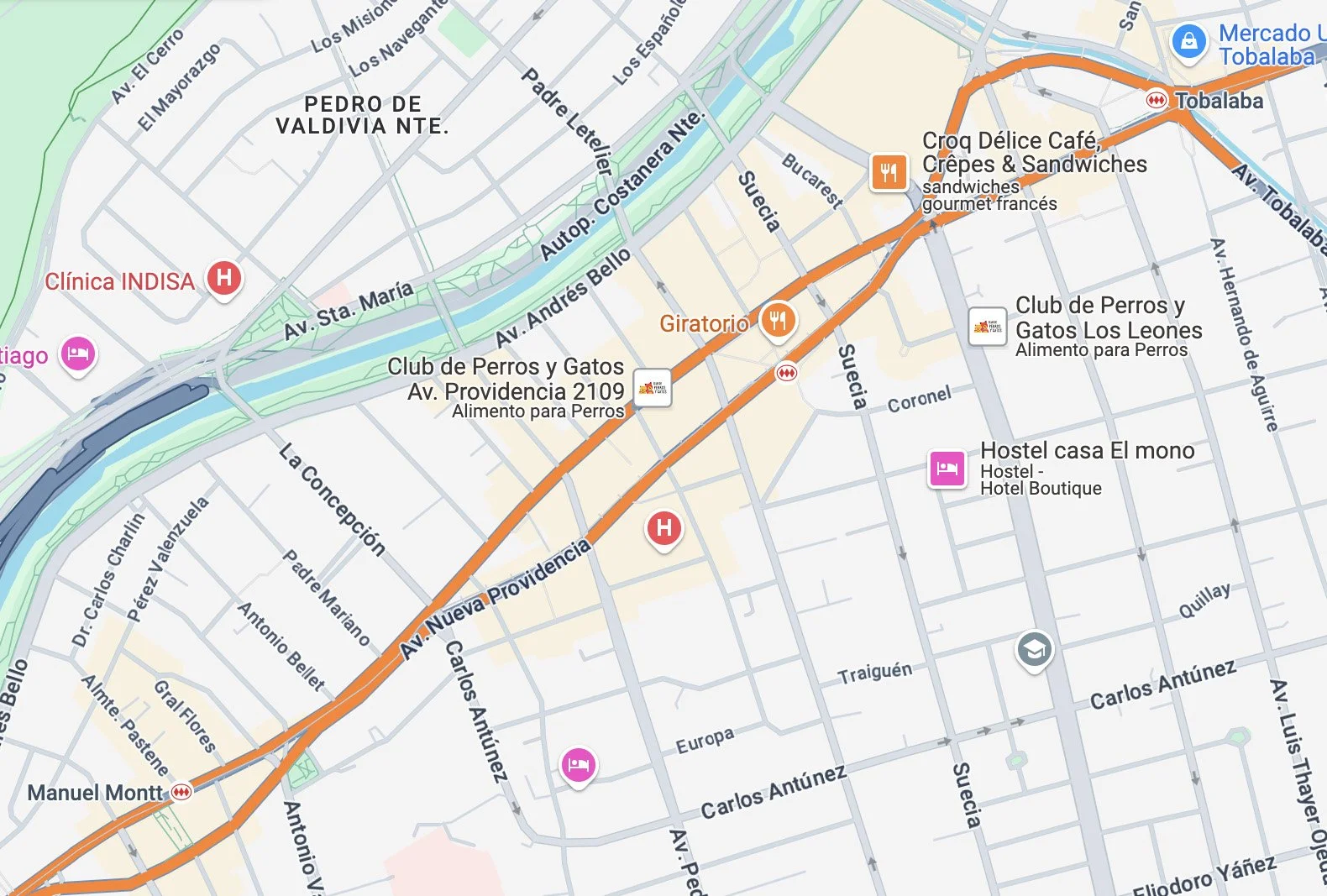 Map of a neighborhood showing streets, parks, and landmarks including clinics, hotels, restaurants, and a metro station.