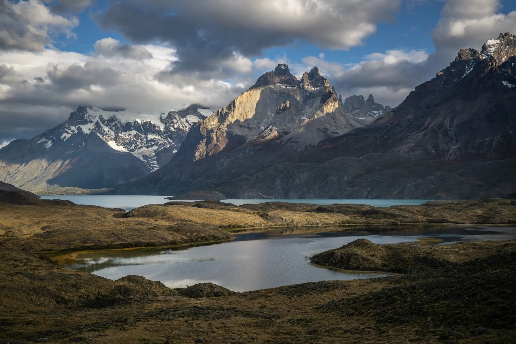 Granite peaks above a glacial lake in Torres del Paine National Park on the W Trek in Chilean Patagonia