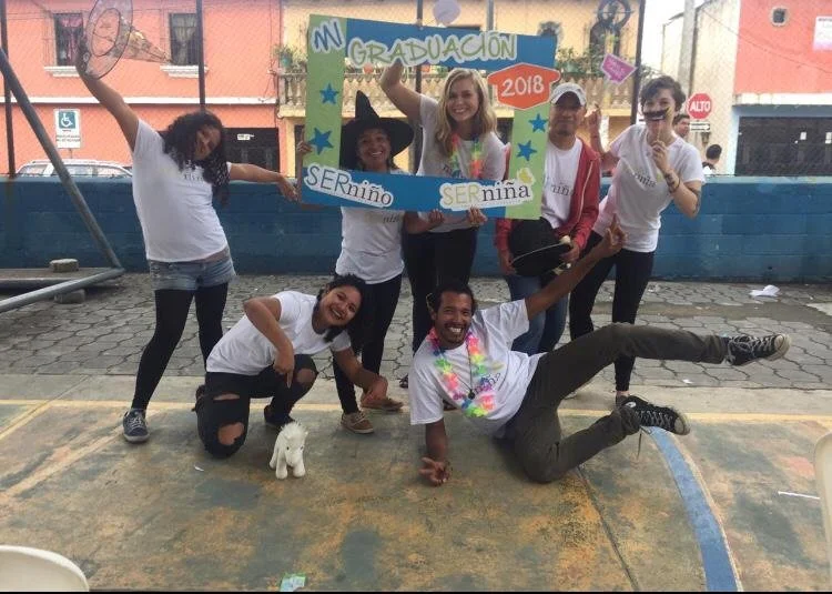  SERniña staff sitting in circle a their 'Nahual and Maya Culture' training with Sanar Conciencia - X'tuxinik. 