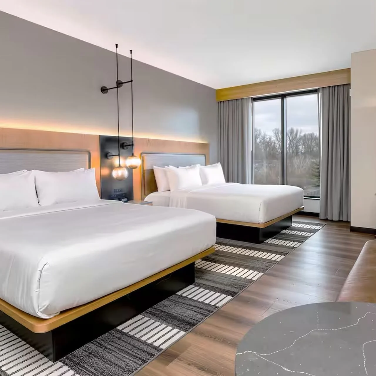 ✨Project Feature: The Key Hotel Dubuque, Tapestry Collection by Hilton 

We recently completed the guestroom portion of this beautiful new hotel, for which we fabricated and installed custom ripplefold drapery and sheers completed by custom valances.