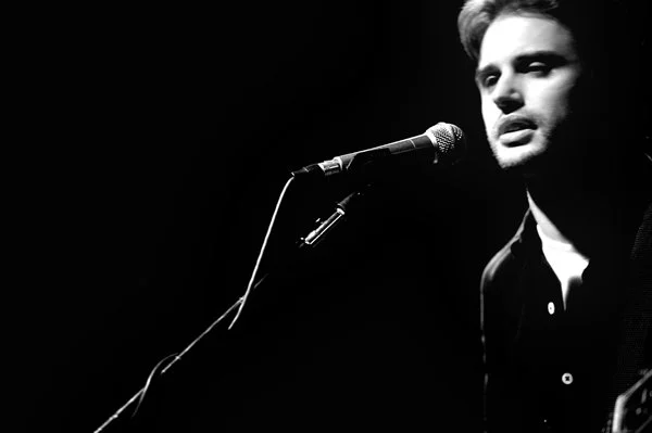 Man in front of microphone