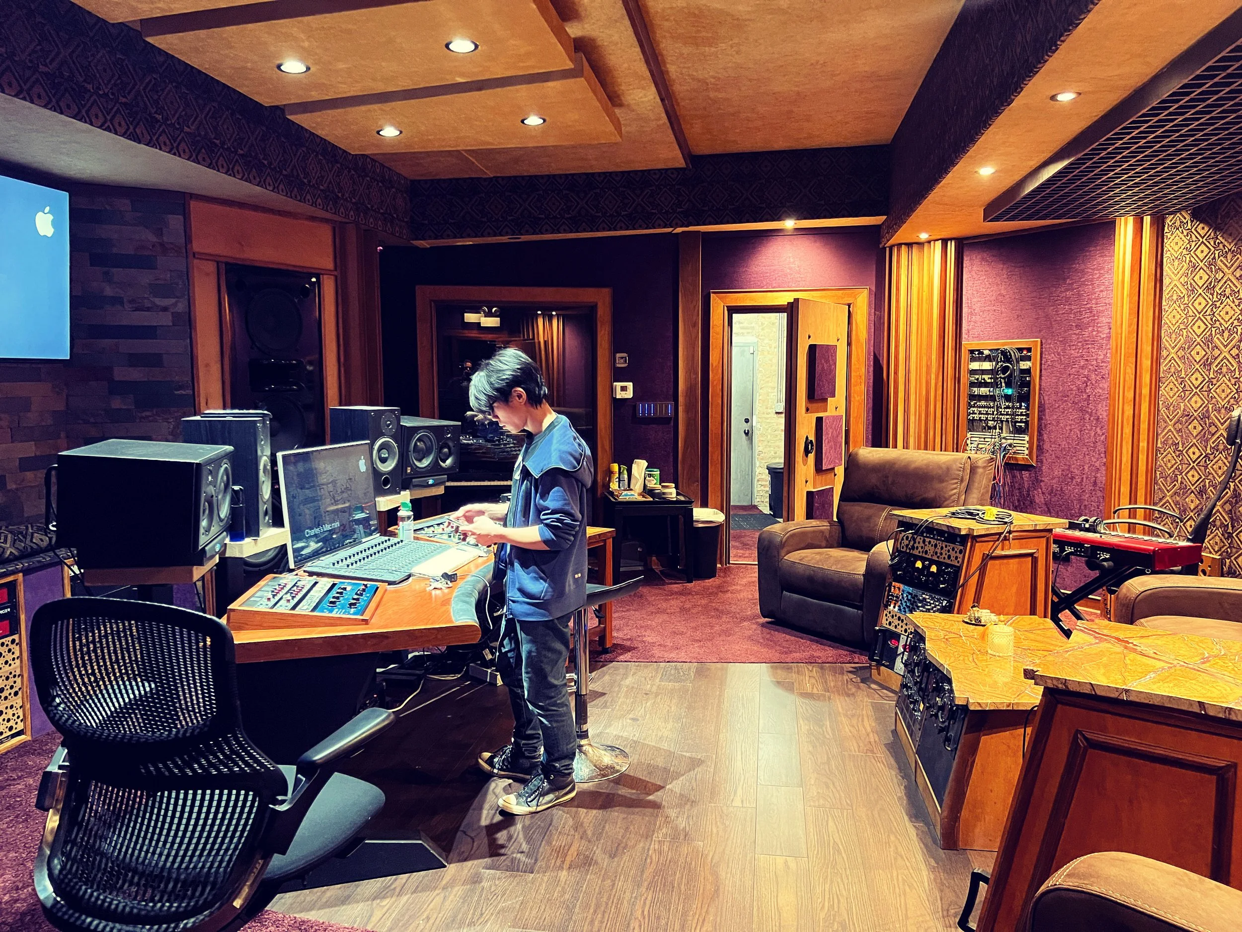Man checking phone in recording studio