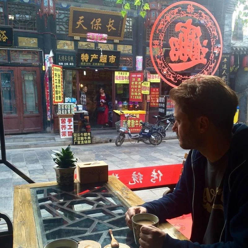 Man at a cafe in China