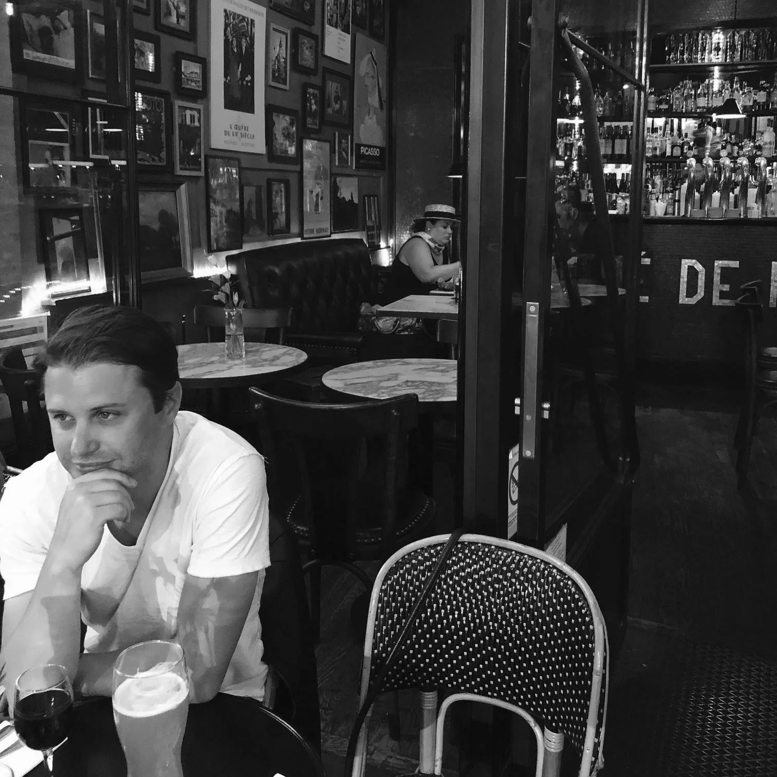 Mat at a cafe in Paris, France