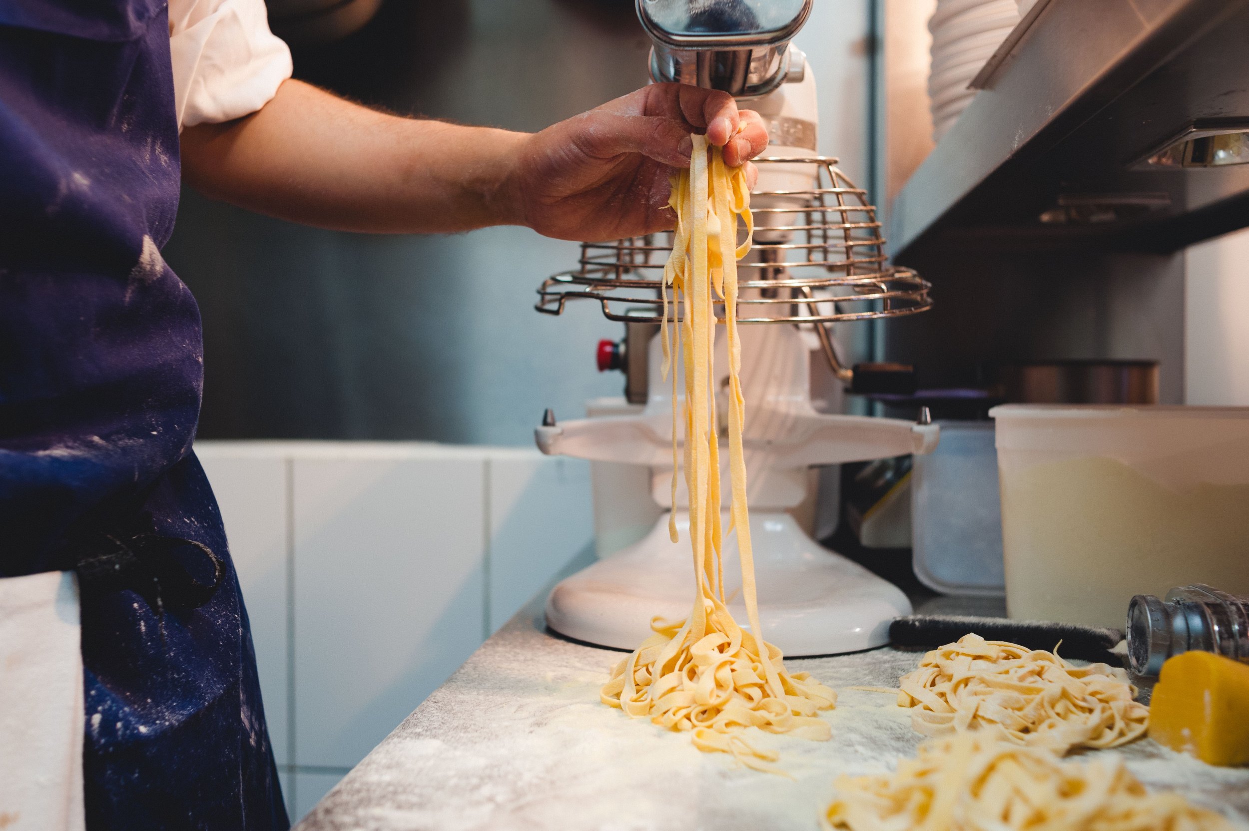 spreading-fresh-linguini-pasta.jpg