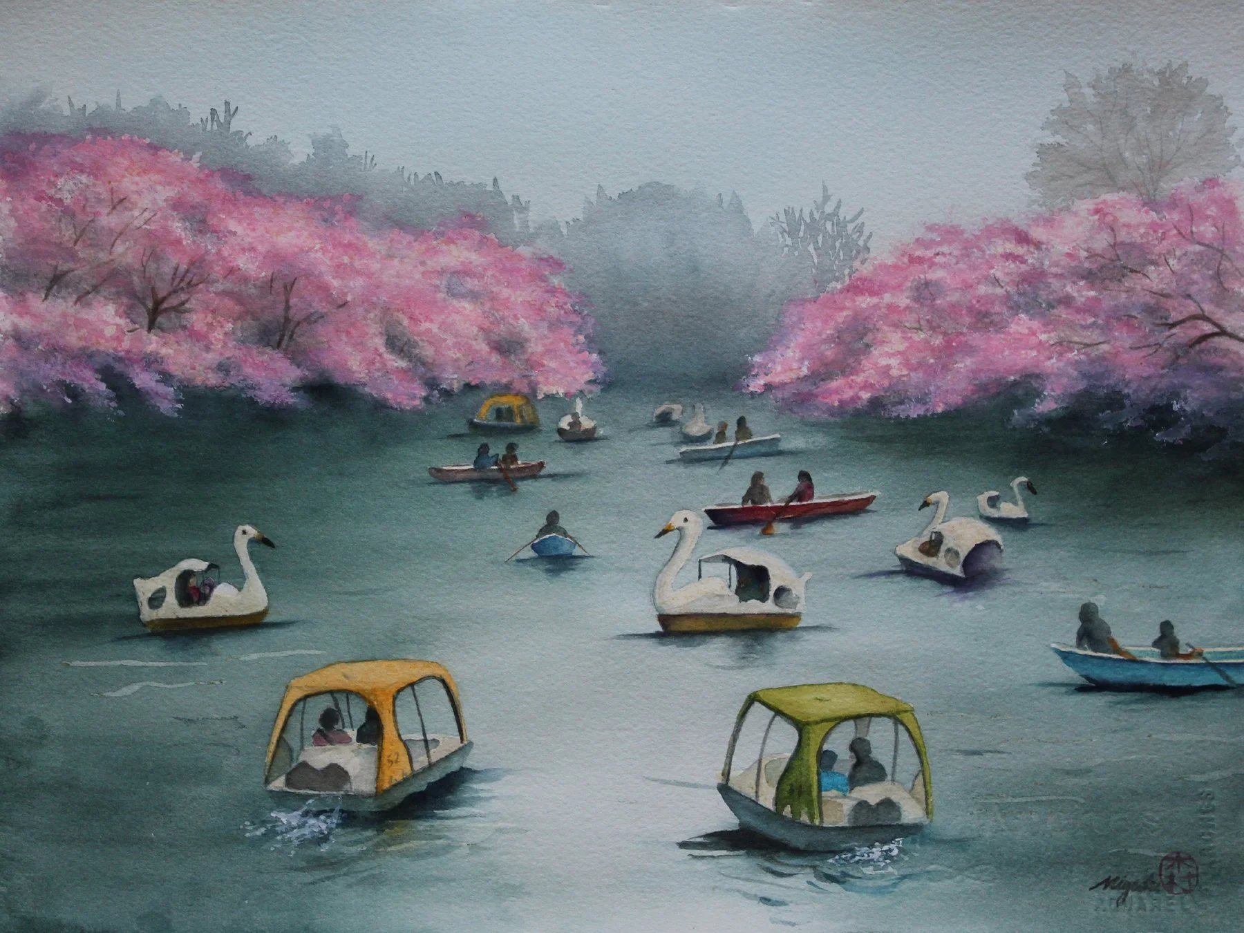 Cherry blossoms and swan boats at Inokashira Park in Tokyo.