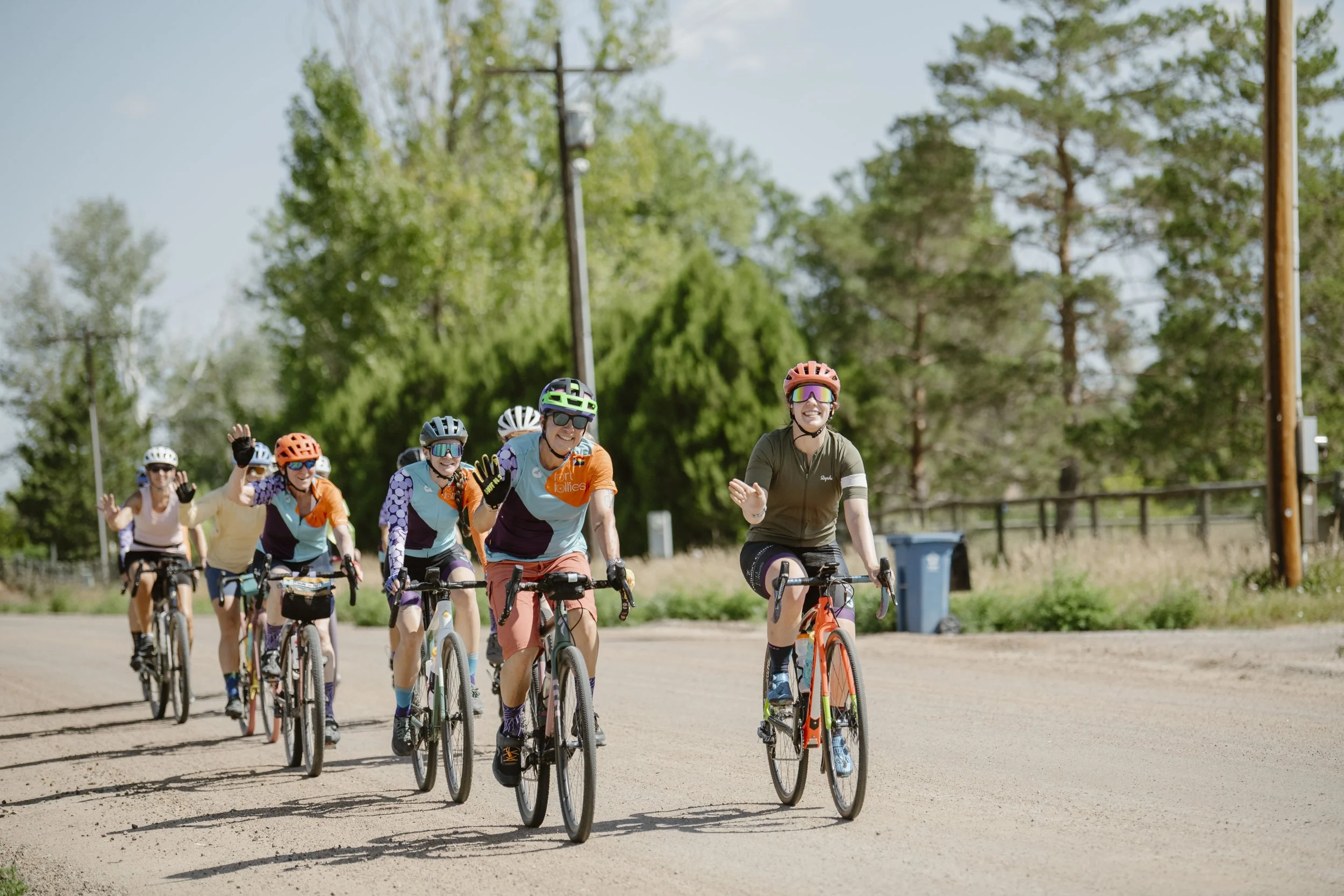 happy women and femme cyclists