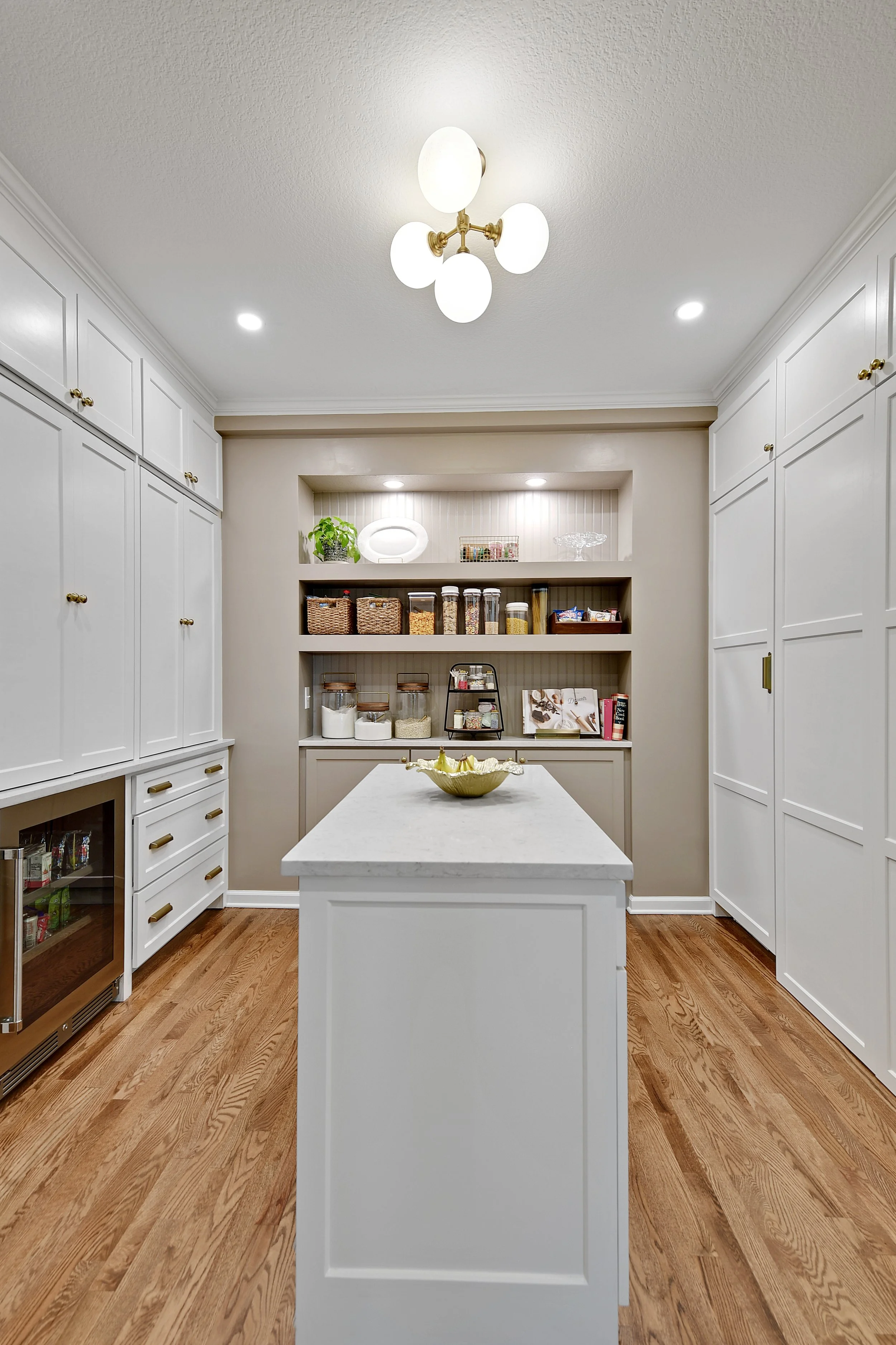 Hidden pantry with built in storagae