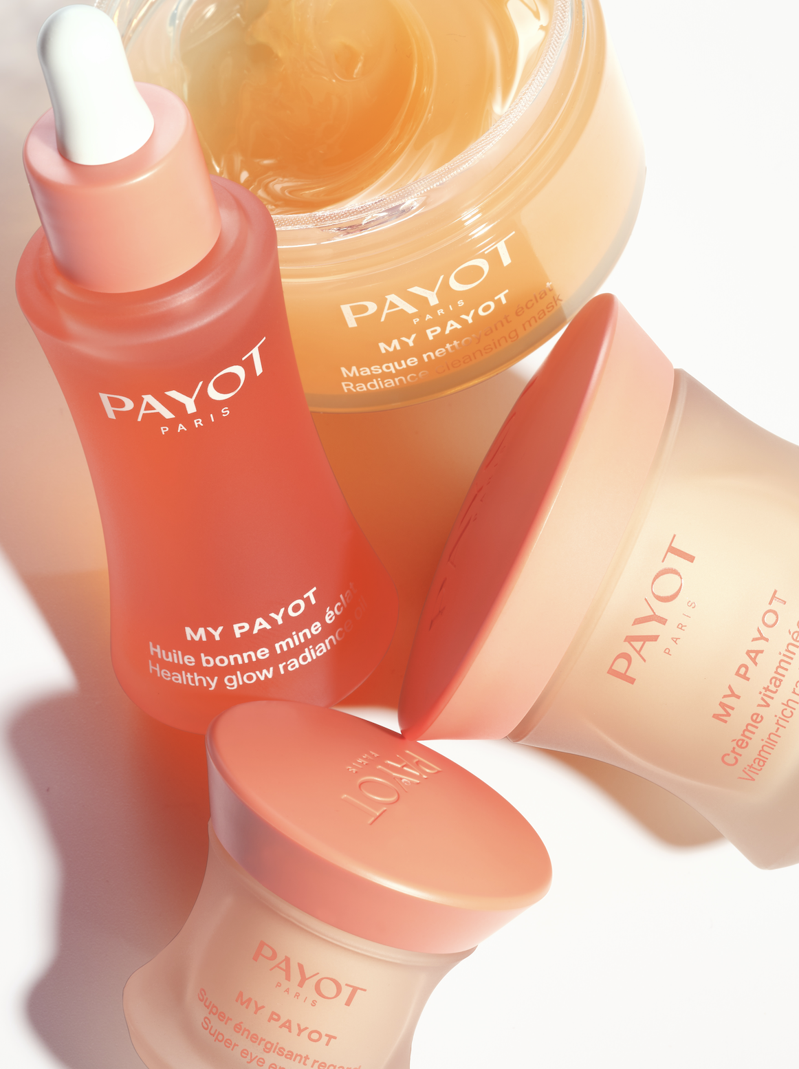 A person wearing dark clothing handing a shopping bag labeled "Circadia" to another person at a store counter of Utopia Skin and Spa.