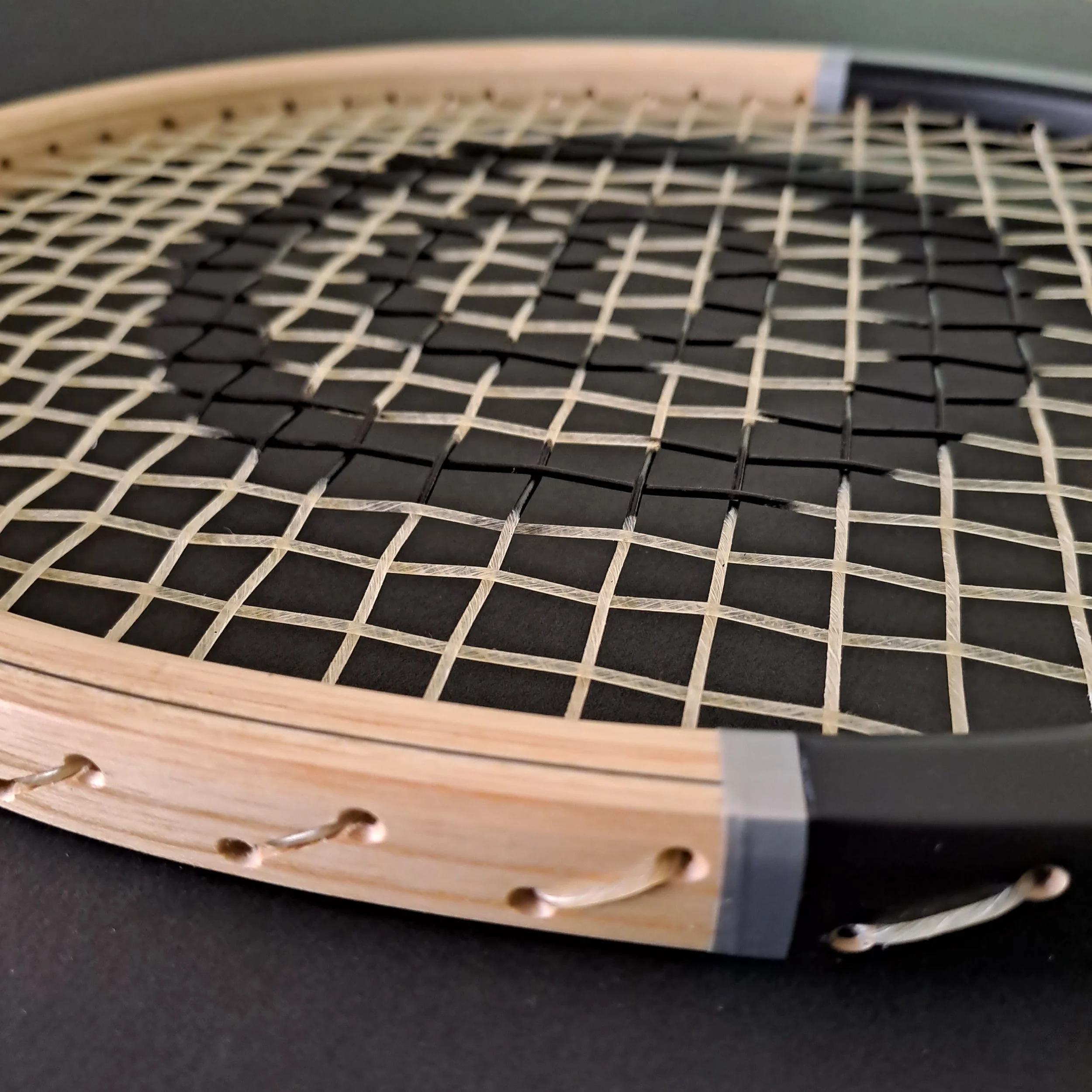 Close-up of the Grays Mystique top of head and strings.
