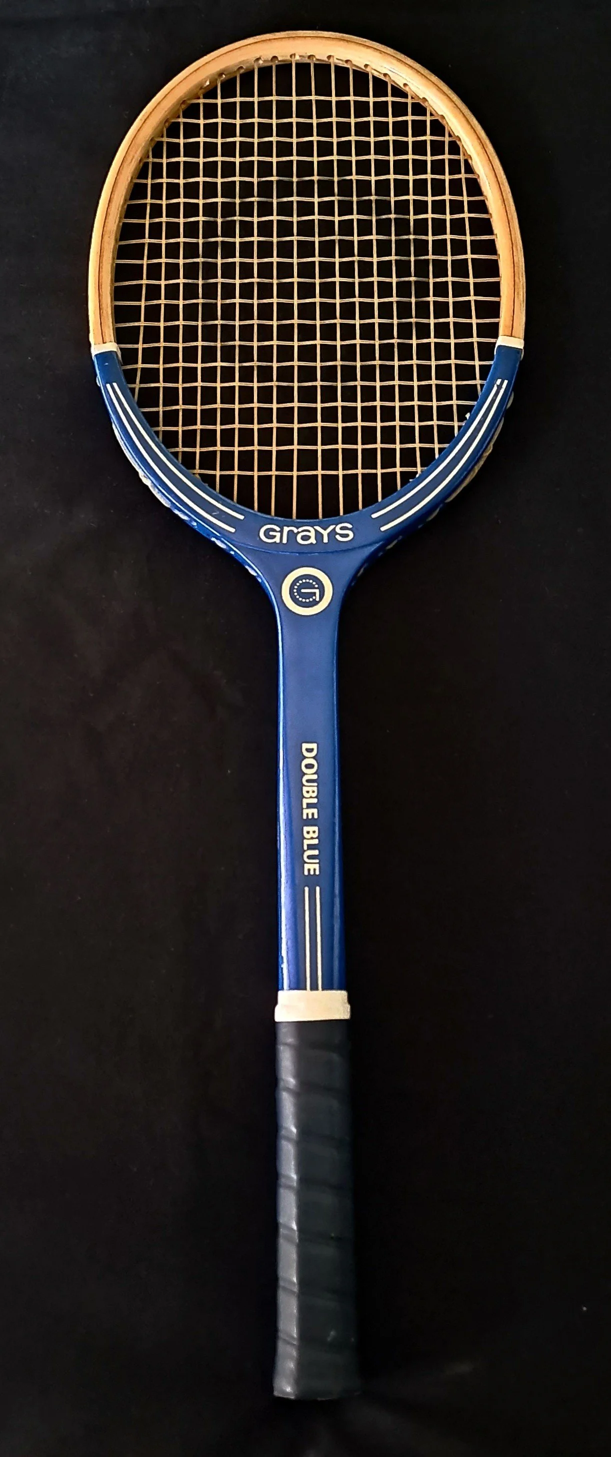 Blue Grays racket against a black background