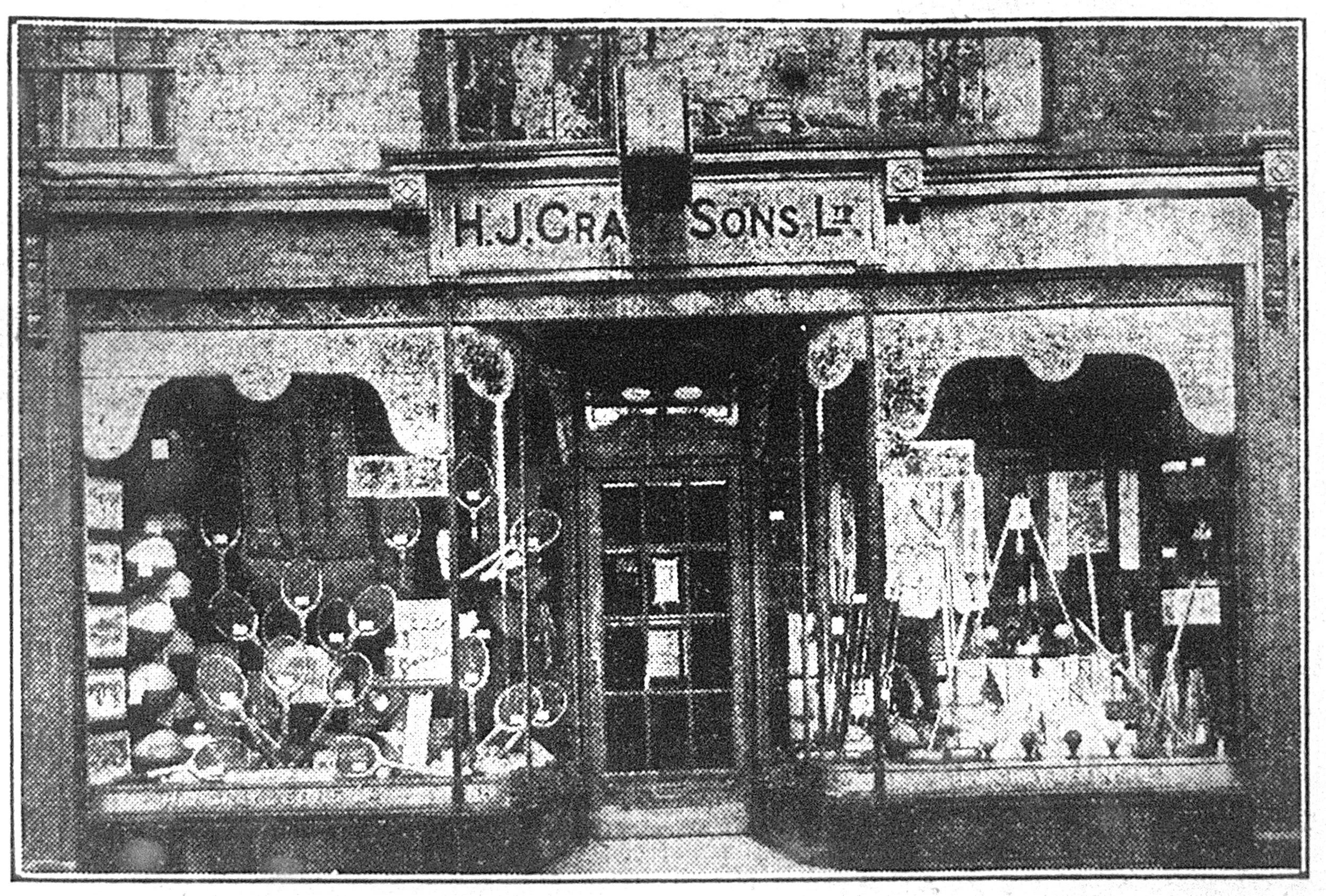 black and white old storefront of H.J. Gray & Sons