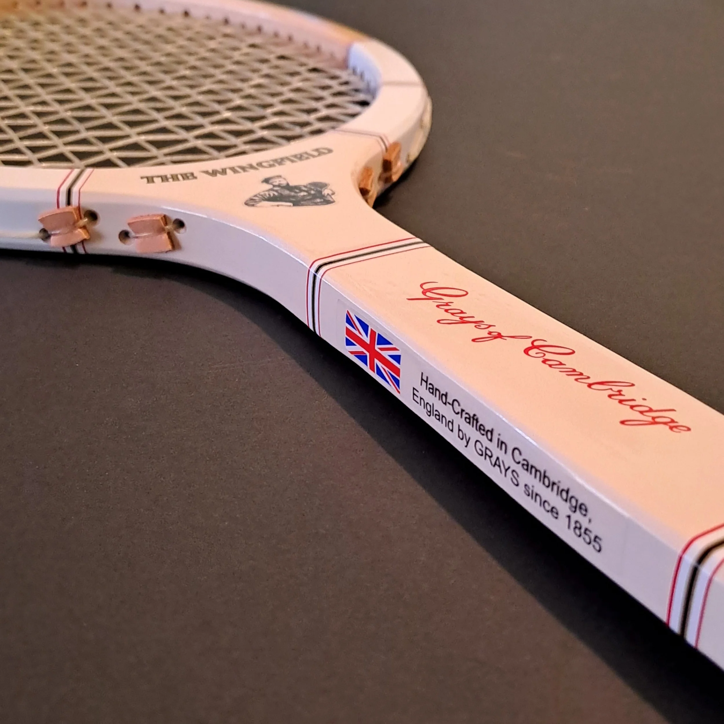 Close-up of Grays The Wingfield from angle showing front and side cosmetics and head and stringing.