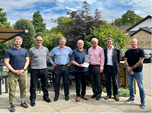 Tim Dowe with Grays management and racket-makers