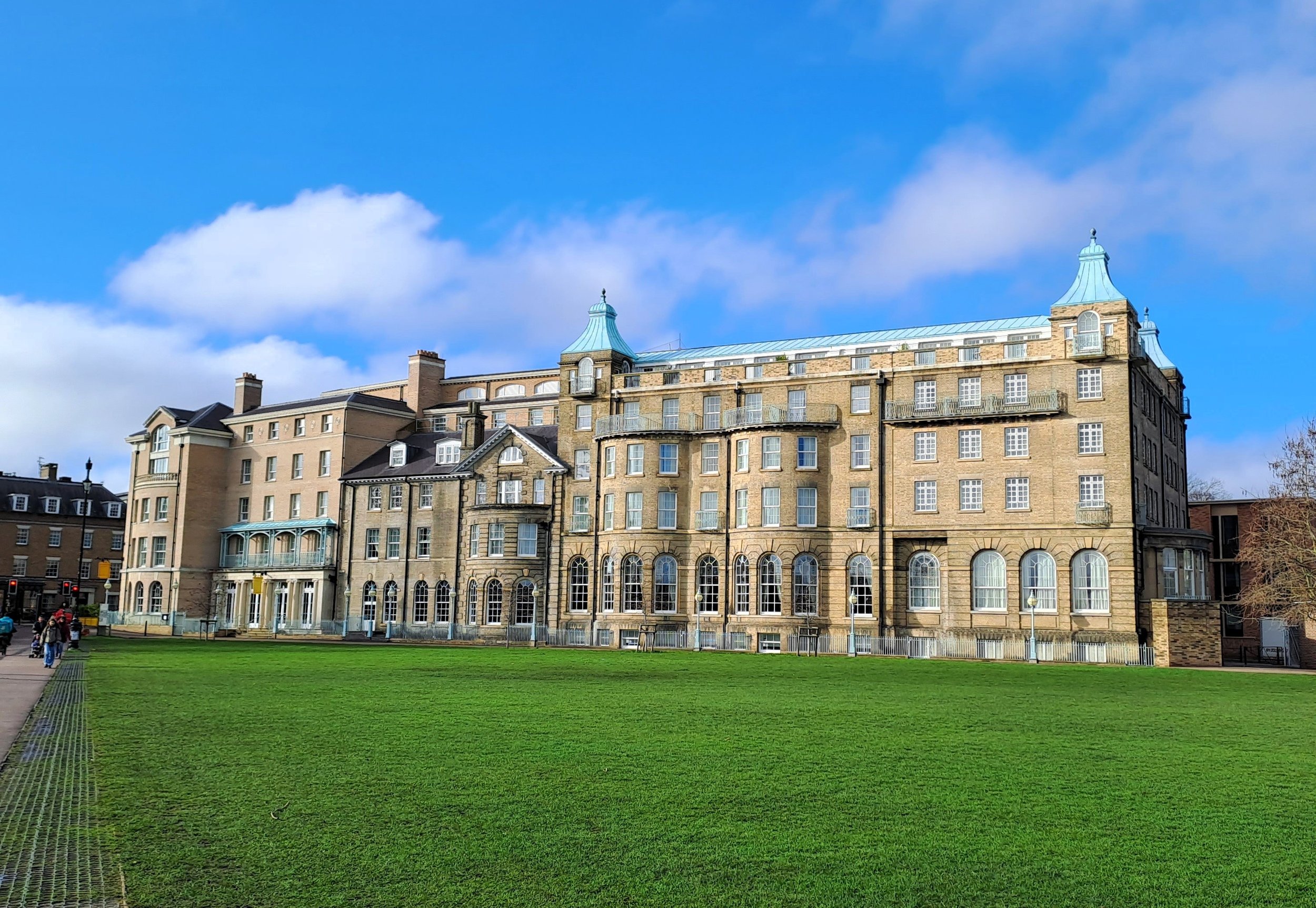 large old building with grass in foreground